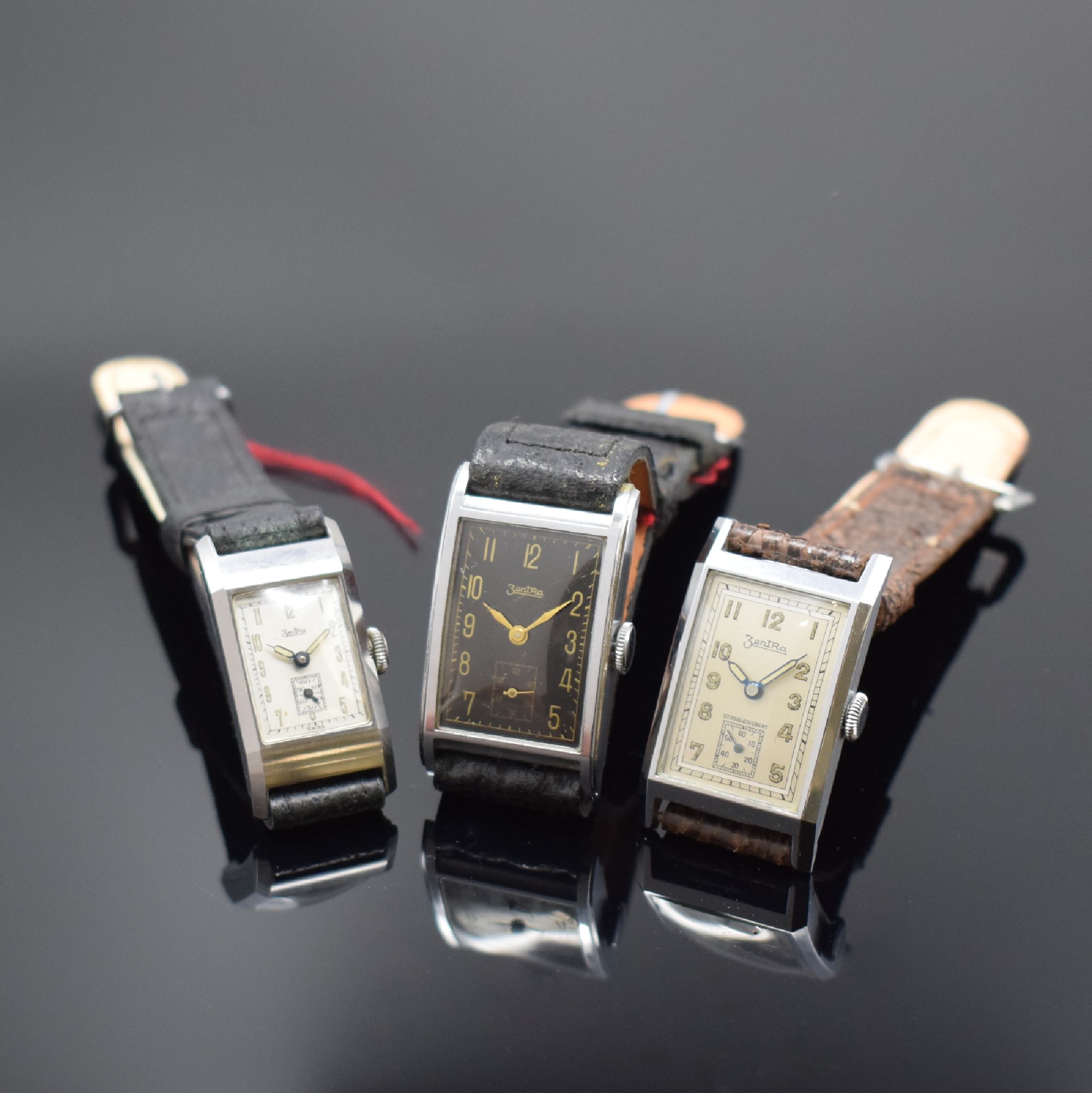 ZENTRA 3 nahezu neuwertige rechteckige Armbanduhren aus altem Lagerbestand, Schweiz um 1935, Handaufzug, 2 verchr. Geh. m. aufgedr. Stahlböden, 1 ...