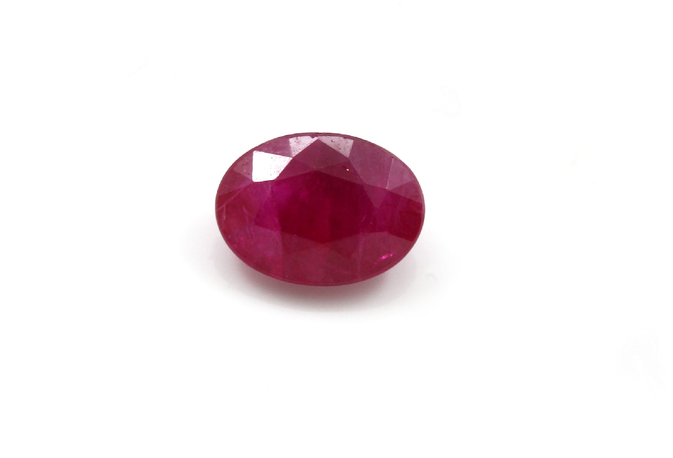 Detail b: Konvolut 6 lose nat. Rubine: 1 x ovalfacett. 0.51 ct, pinkish Red, 6.01 x 4.27 x 2.11 mm, beh.; 1 x ovalfacett. 0.96 ct, pinkish Red, 7.04 x 5.17 x ...