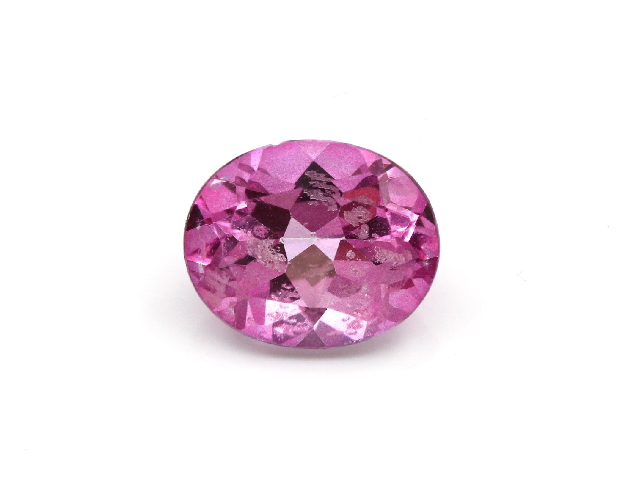 Loser pinkfarb. Topas (beh.), ca. 4.29 ct, ovalfacett.