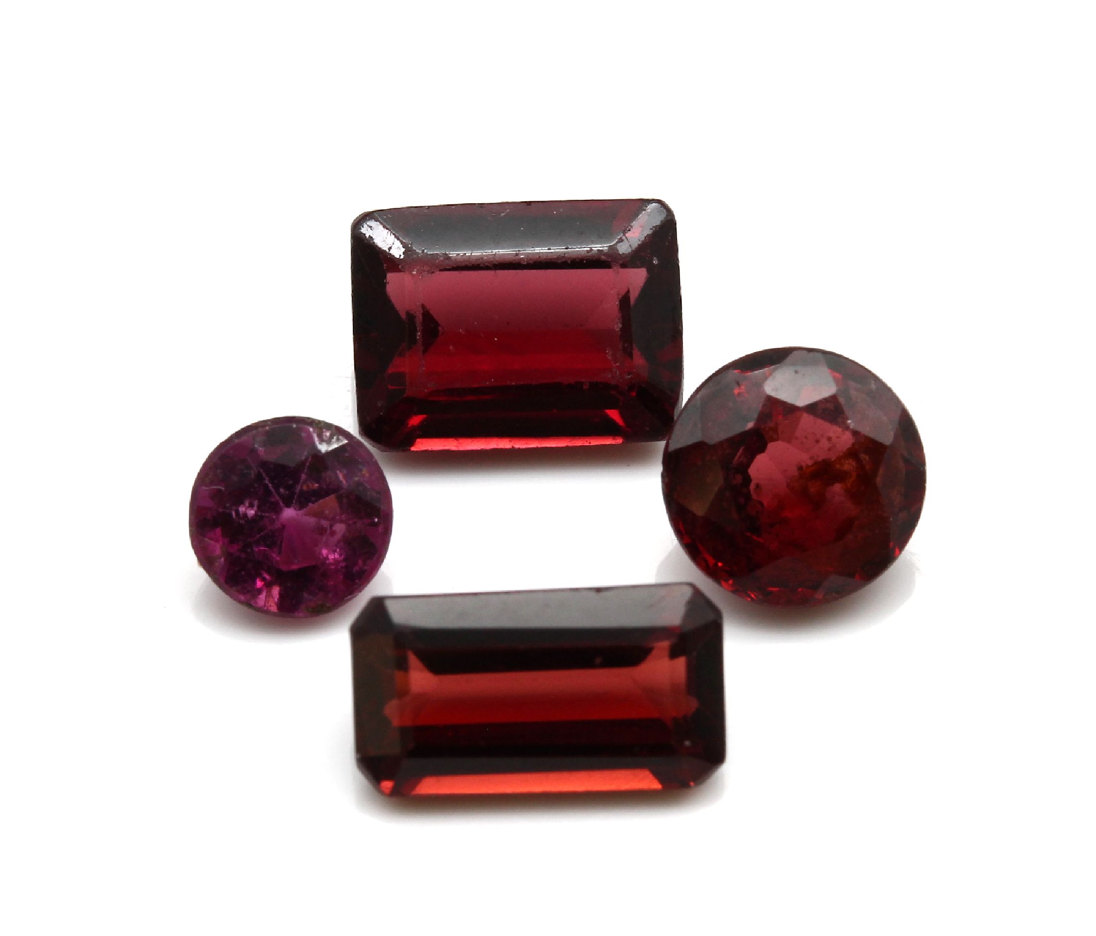 Konvolut 10 lose Granate zus. ca. 14.40 ct, versch. Größen, Formen und Rottöne