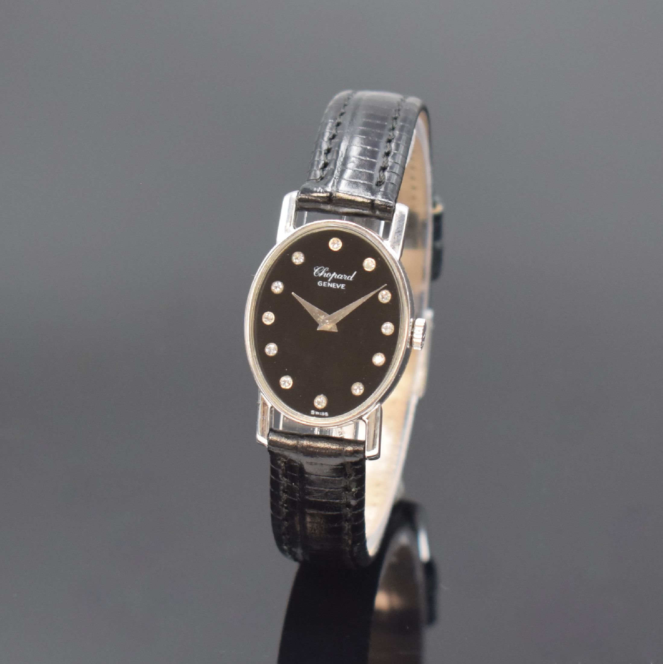 CHOPARD Damenarmbanduhr in WG 750/000 Referenz 5042 1, Handaufzug, Schweiz um 1973, 2- teil. Geh., Boden aufgedr., Onyx-Zifferbl. m. 12 in WG gef. ...