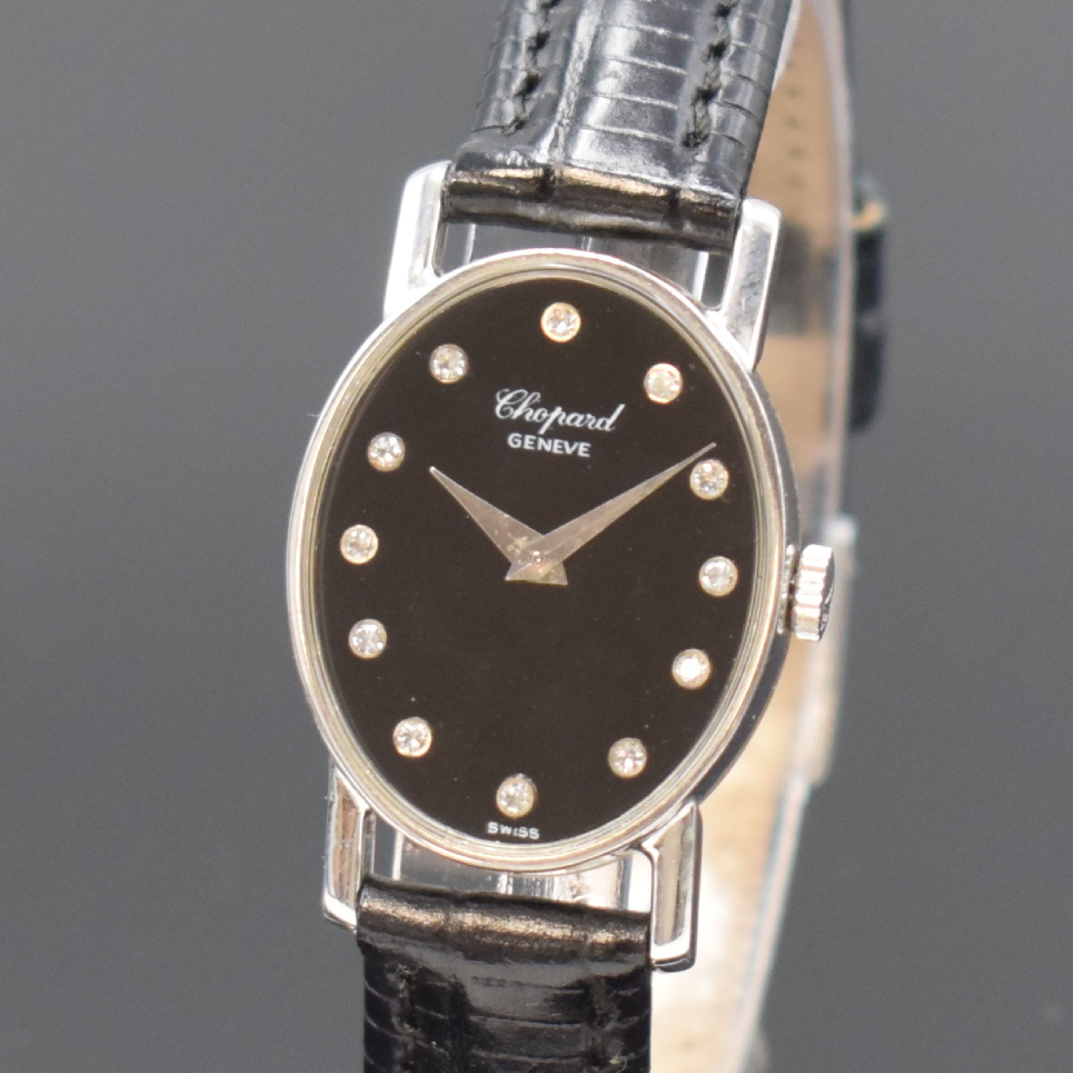 Detail a: CHOPARD Damenarmbanduhr in WG 750/000 Referenz 5042 1, Handaufzug, Schweiz um 1973, 2- teil. Geh., Boden aufgedr., Onyx-Zifferbl. m. 12 in WG gef. ...