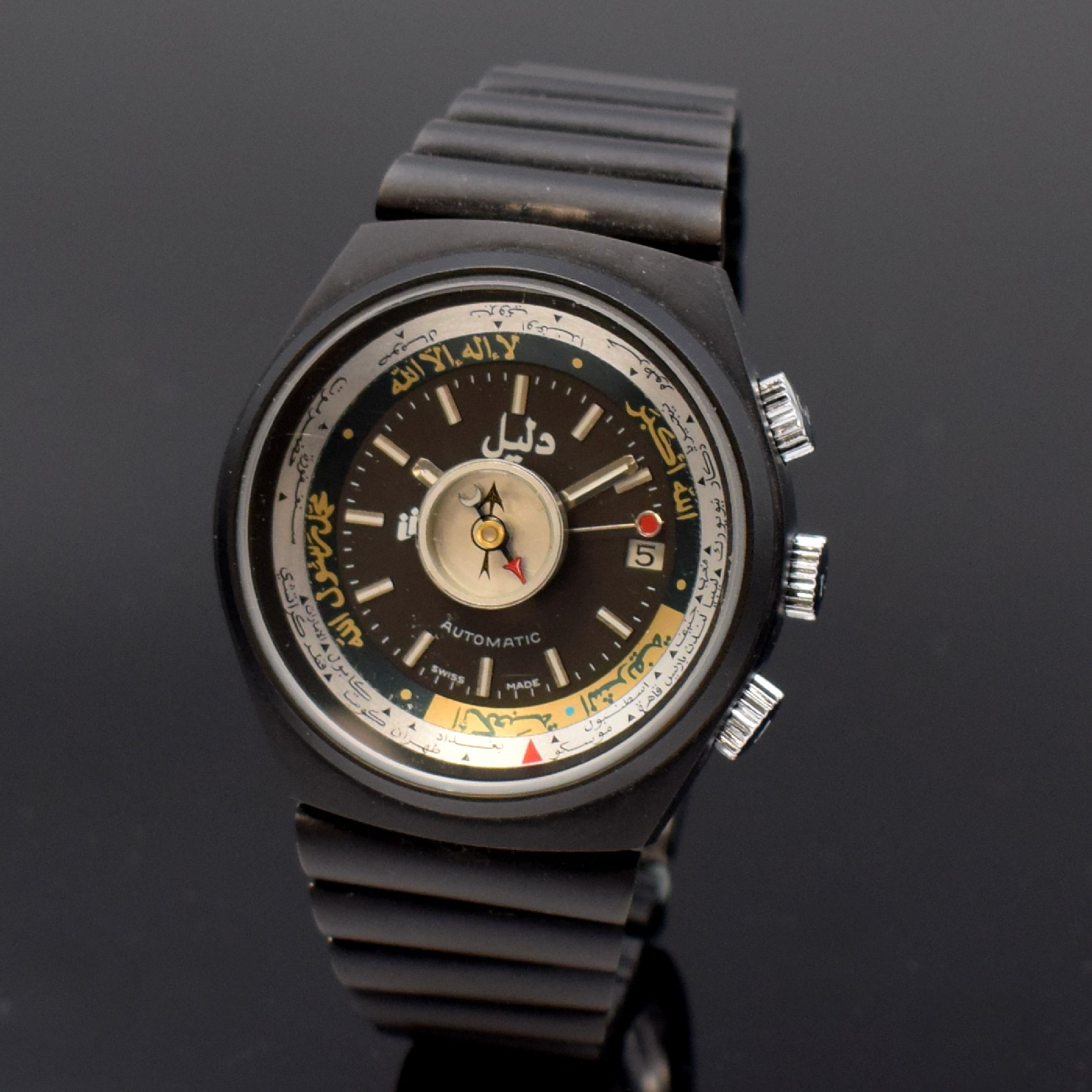 DALIL sog. Moslems-Watch gut erhaltene Herrenarmbanduhr mit Kompass, Schweiz um 1975, Automatik, geschwärztes Gehäuse inkl. Gliederband m. ...