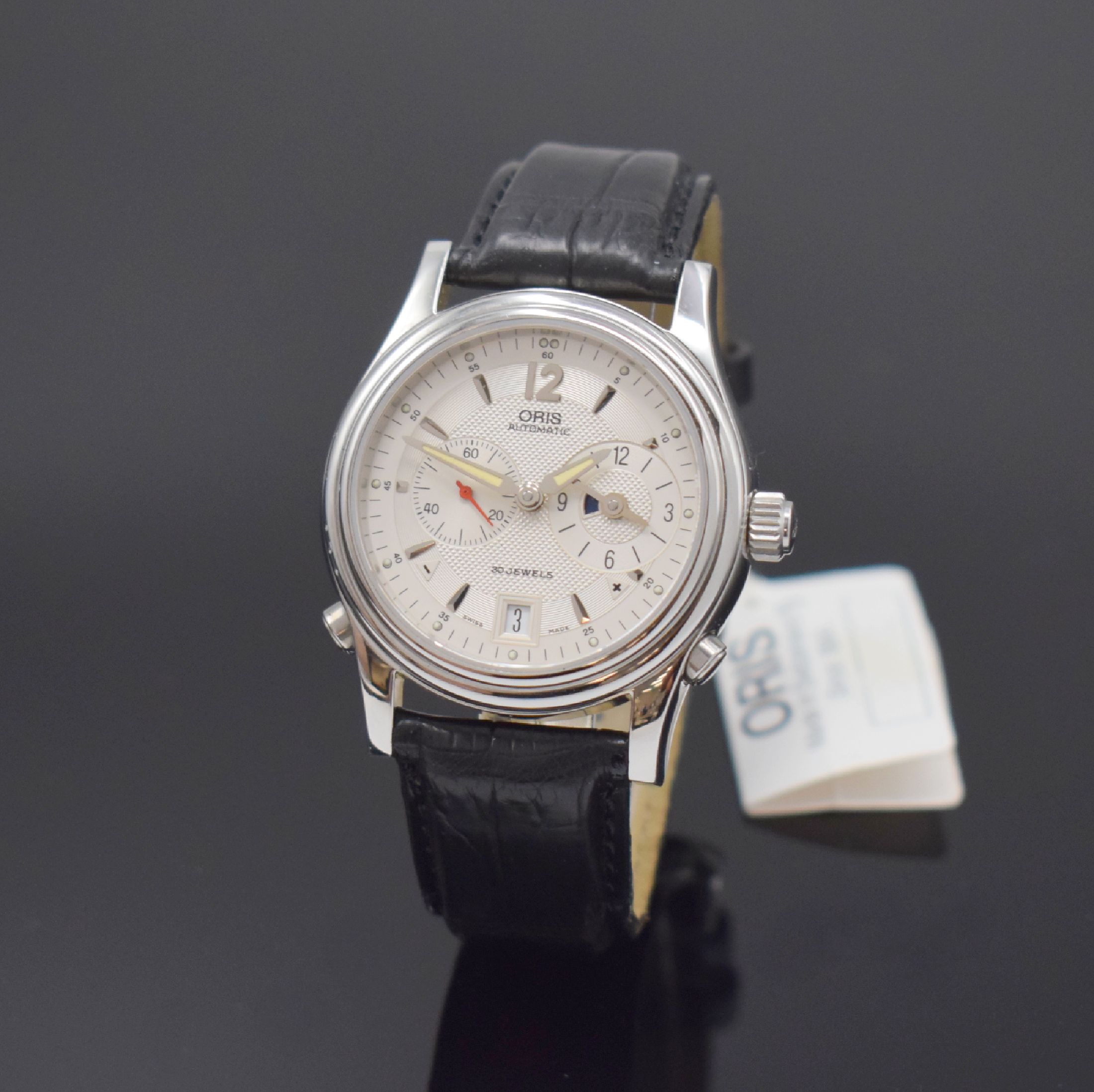 ORIS Herrenarmbanduhr mit zweiter Zeitzone, Schweiz um 1998, Automatik, Ref. 7485, beids. Saphirvergl. Geh. in Stahl, orig Lederband m. Dornschl., ...
