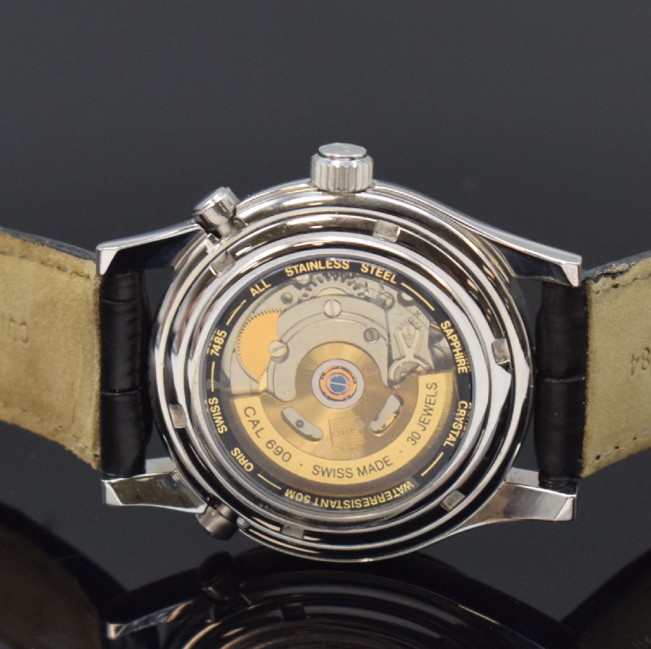 Detail d: ORIS Herrenarmbanduhr mit zweiter Zeitzone, Schweiz um 1998, Automatik, Ref. 7485, beids. Saphirvergl. Geh. in Stahl, orig Lederband m. Dornschl., ...