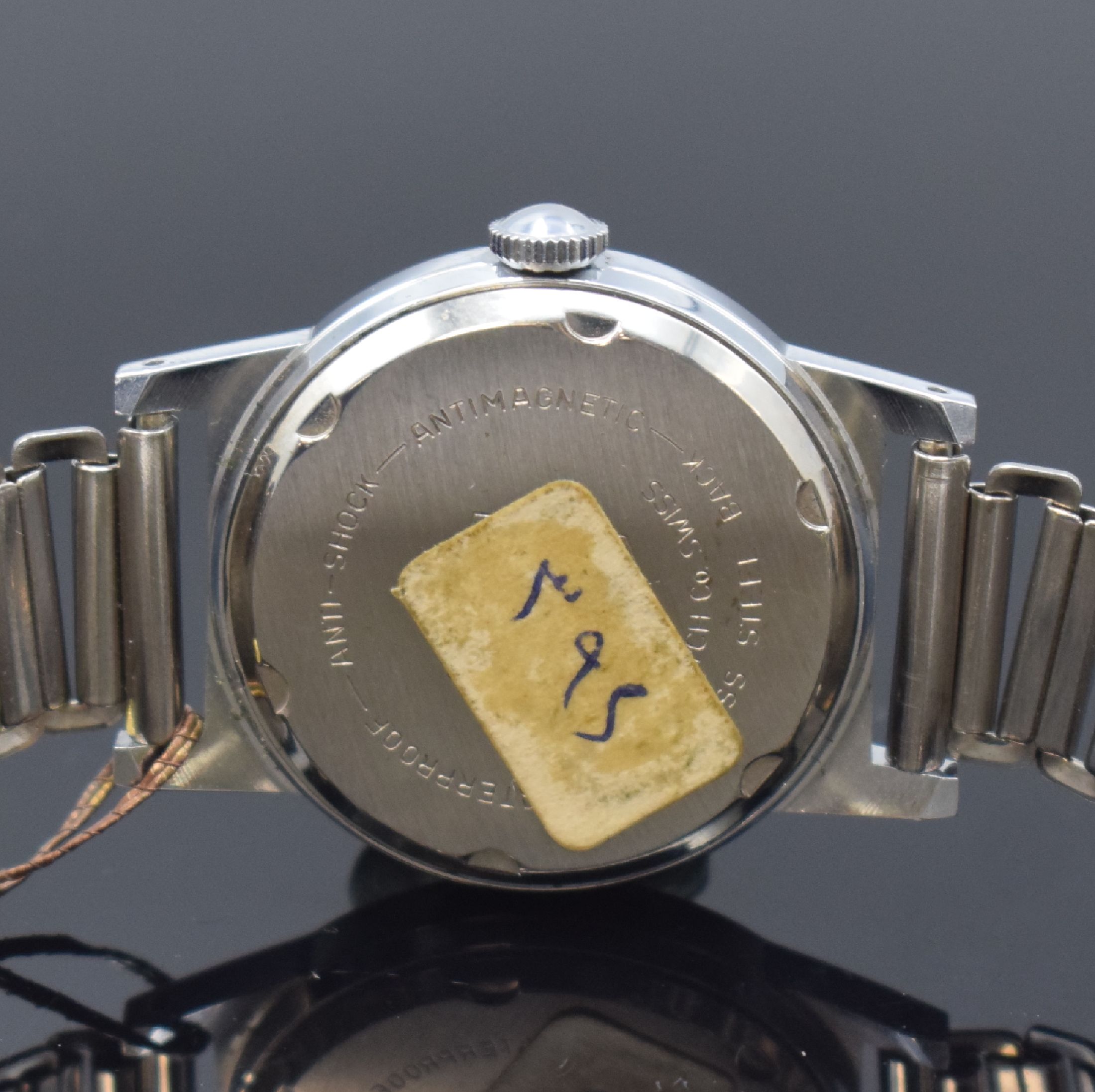 Detail b: ORIS 3 ungetragene Armbanduhren, Schweiz um 1950/1960, Handaufzug, verchromte Gehäuse, Stahlböden verschr., weiße u. silb. Zifferblätter, 2x ...