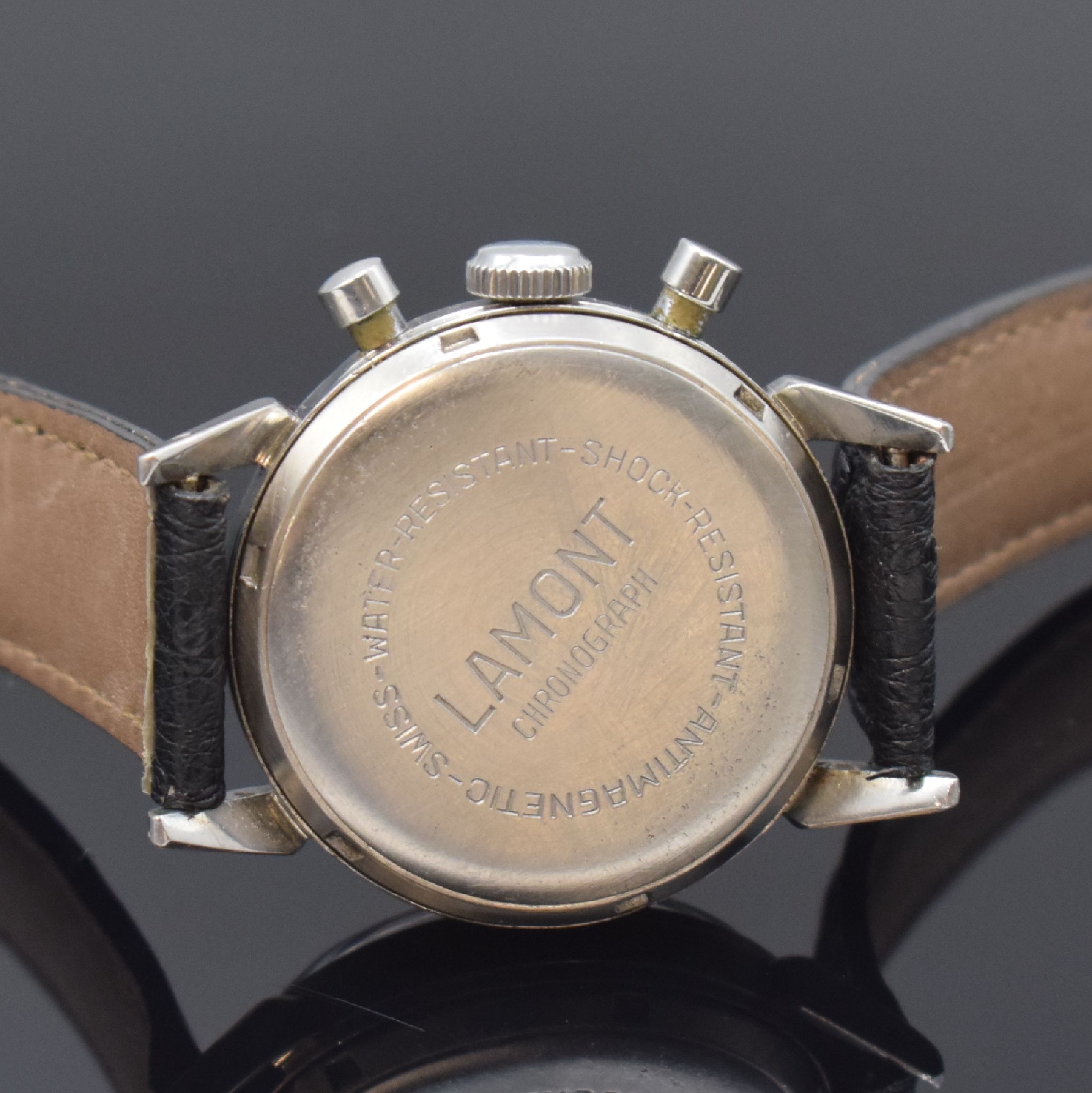 Detail c: NIVADA Schaltrad Herrenchronograph Compensamatic in Stahl, Schweiz um 1955, Handaufzug, verschr. Boden m. Bezeichnung LAMONT, silb. Zifferbl. fl., ...