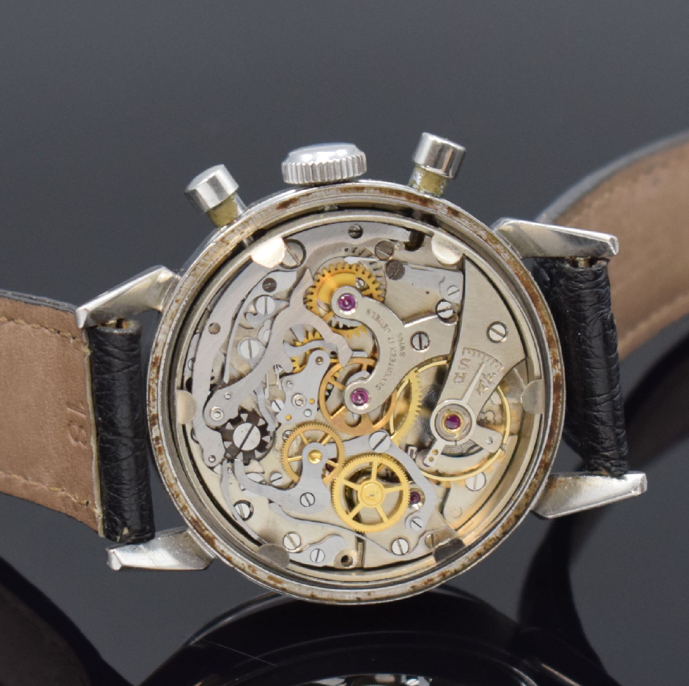 Detail d: NIVADA Schaltrad Herrenchronograph Compensamatic in Stahl, Schweiz um 1955, Handaufzug, verschr. Boden m. Bezeichnung LAMONT, silb. Zifferbl. fl., ...