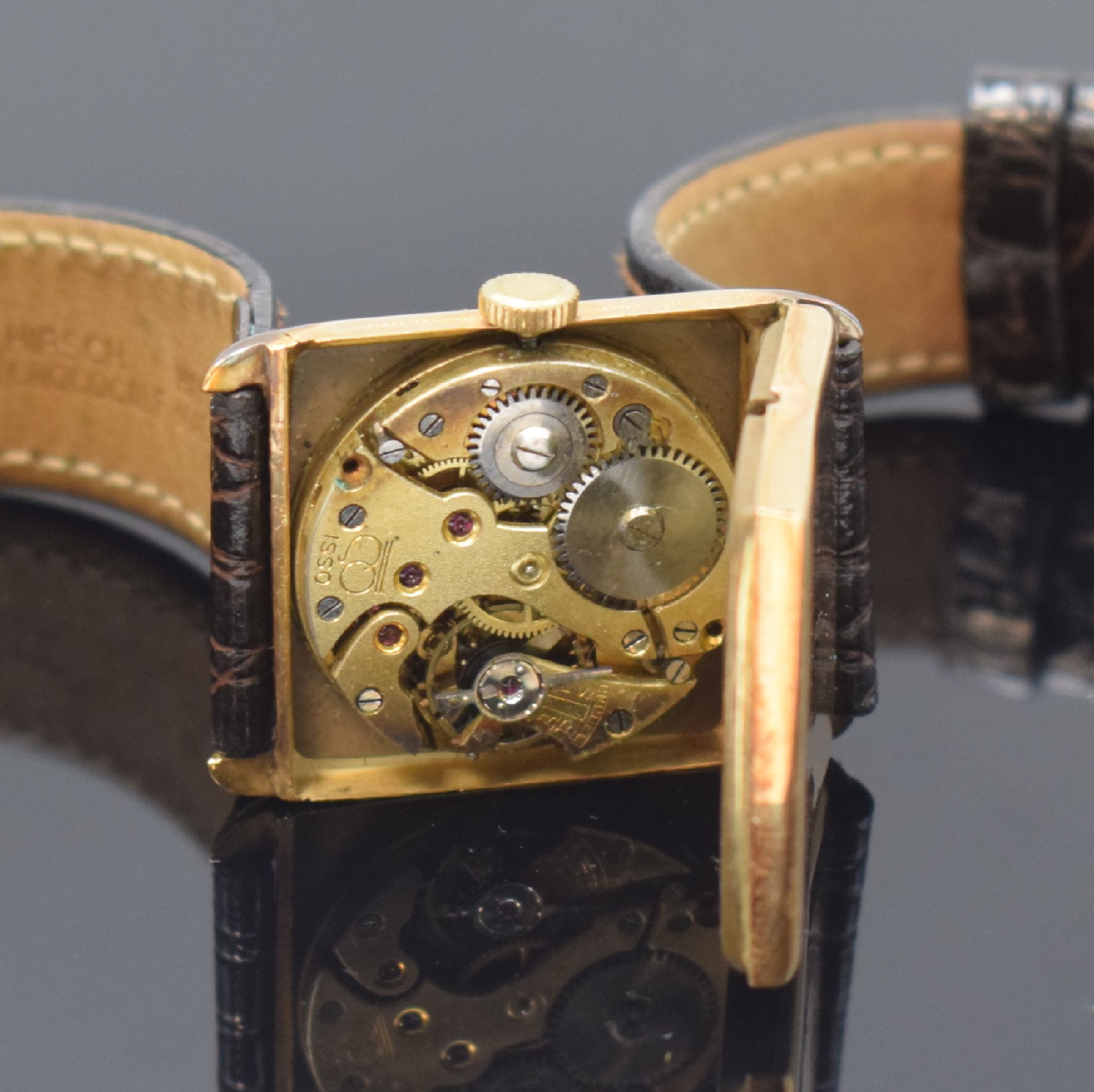 Detail d: Frühe Armbanduhr in GG 585/000, Schweiz um 1920, Handaufzug, floral grav. Geh. dell., Scharnierboden, guill. Duoton-Zifferbl. m. arab. Zahlen, gebl. ...