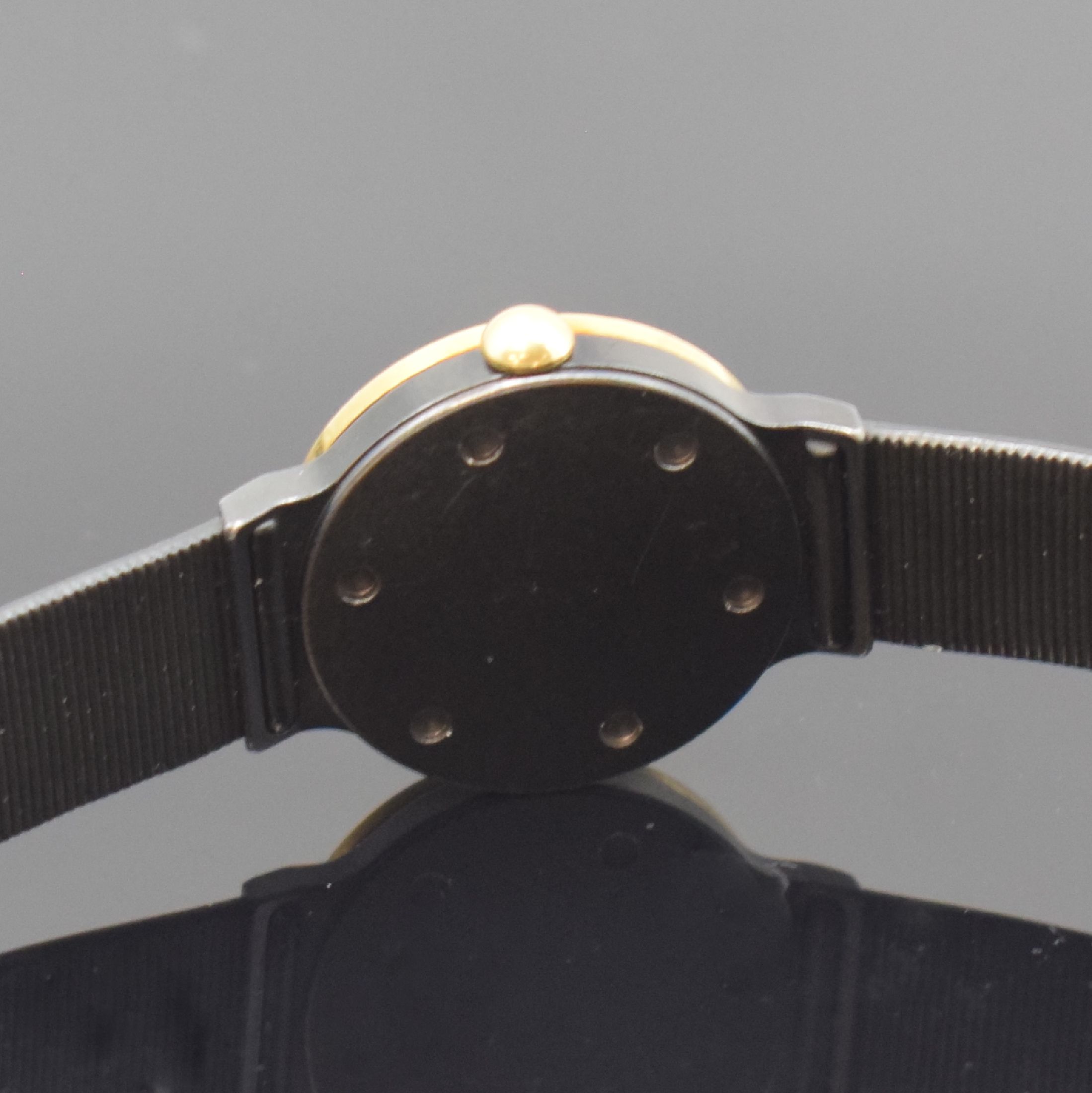 Detail c: IWC / PORSCHE DESIGN Damenarmbanduhr, Schweiz um 1990, quarz, geschw. Geh. inkl. Kautschukband m. Faltschl., Goldlünette, Boden verschr., schwarzes ...