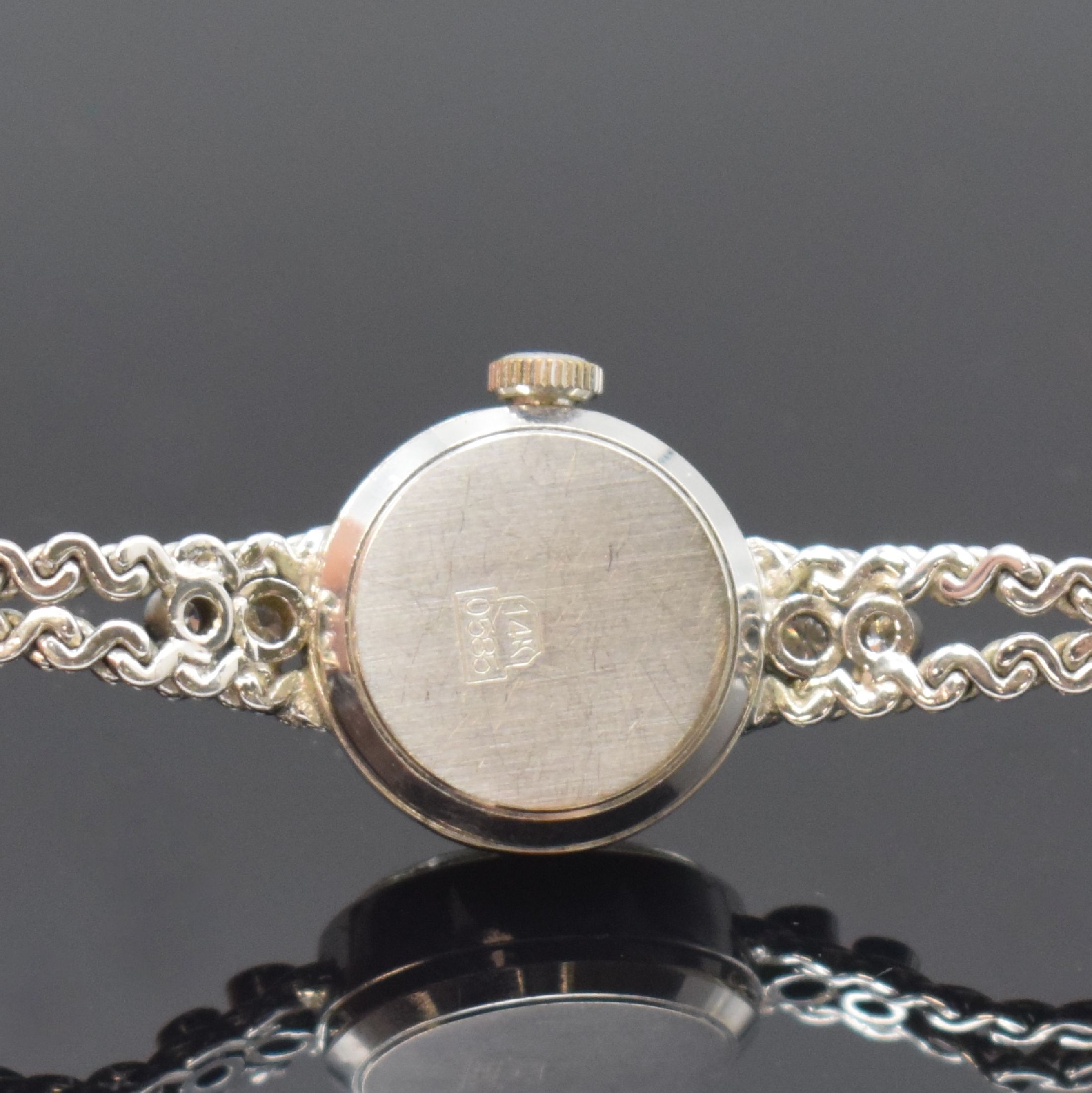 Detail d: Damen Schmuckuhr in WG 585/000 bezeichnet Arctos, Deutschland um 1970, auf quarz umgerüstet, Boden aufgedr., Band zum Geh. m. 4 Diamanten bes., Anz. ...