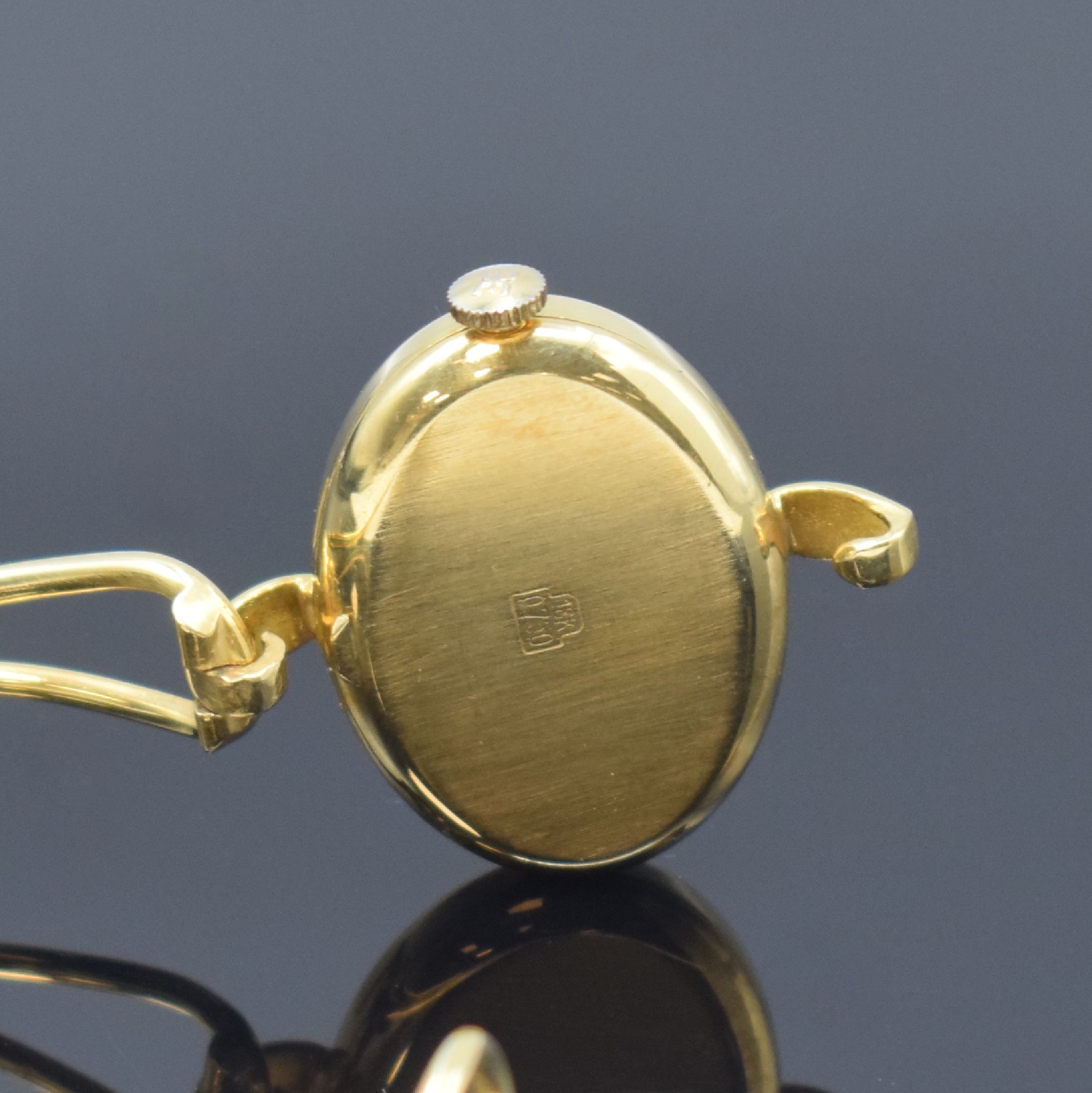 Detail c: EBEL Damenarmbanduhr in GG 750/000, Handaufzug, Schweiz um 1970, neutr. 2-teil. Geh. an Goldspange, Boden aufgedr., gold. Zifferbl. m. 4 aufgel. ...