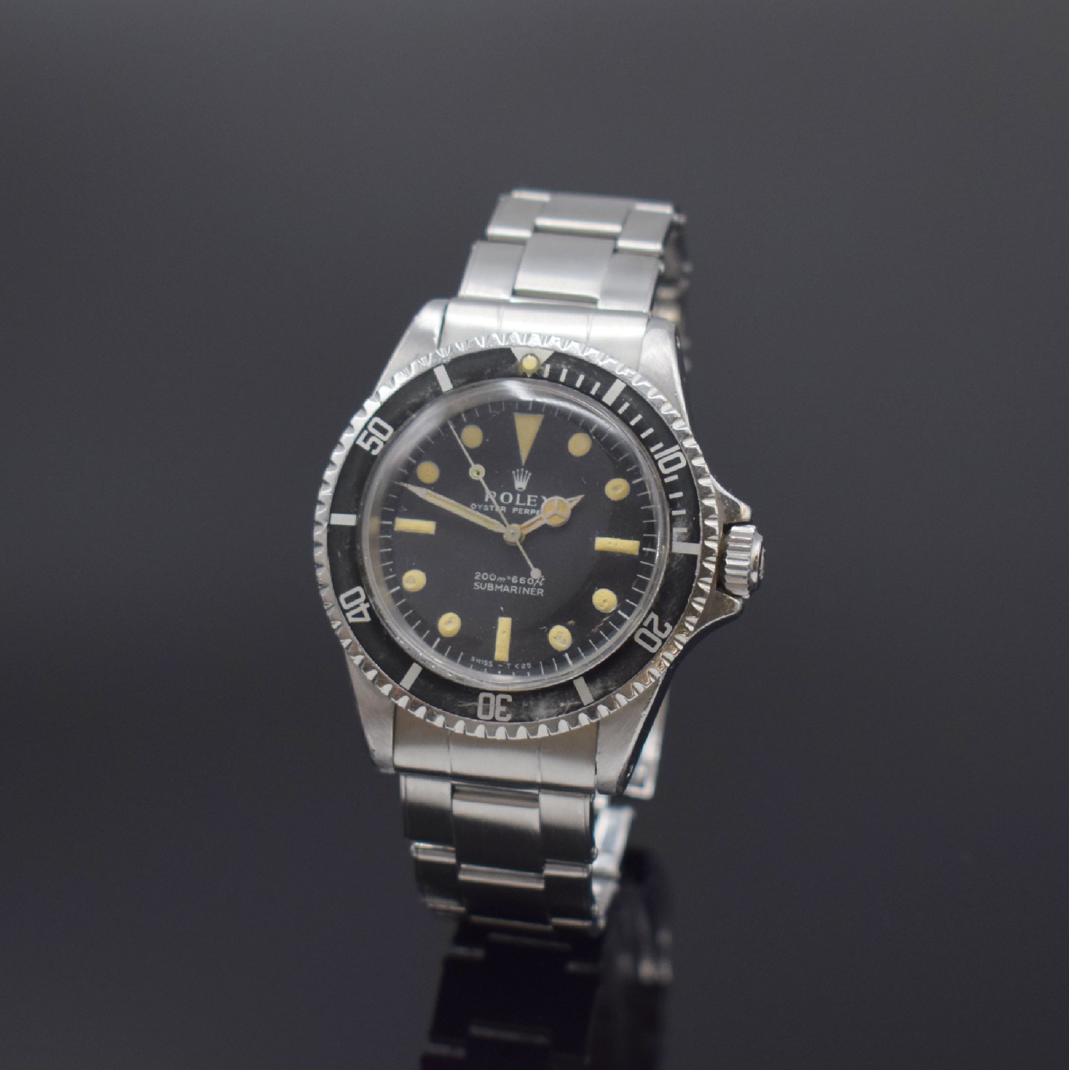 ROLEX Oyster Perpetual Submariner Referenz 5513 Herrenarmbanduhr in Stahl, Schweiz, 1. Quartal 1966 lt. Bodengravur, verschr. Oystergeh, vernietetes ...