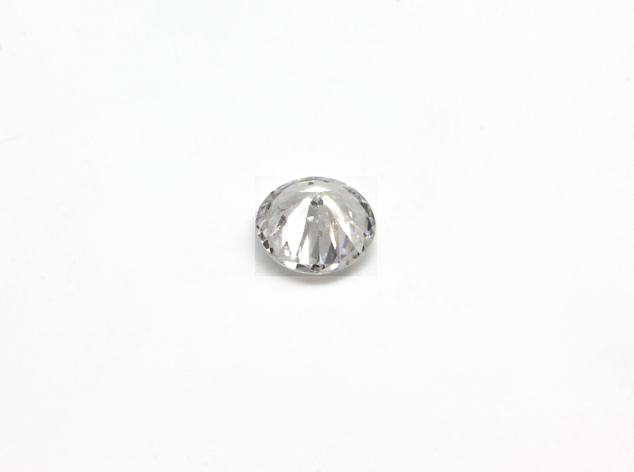 Detail b: Loser Brillant, ca. 0.59 ct Weiß/vs1