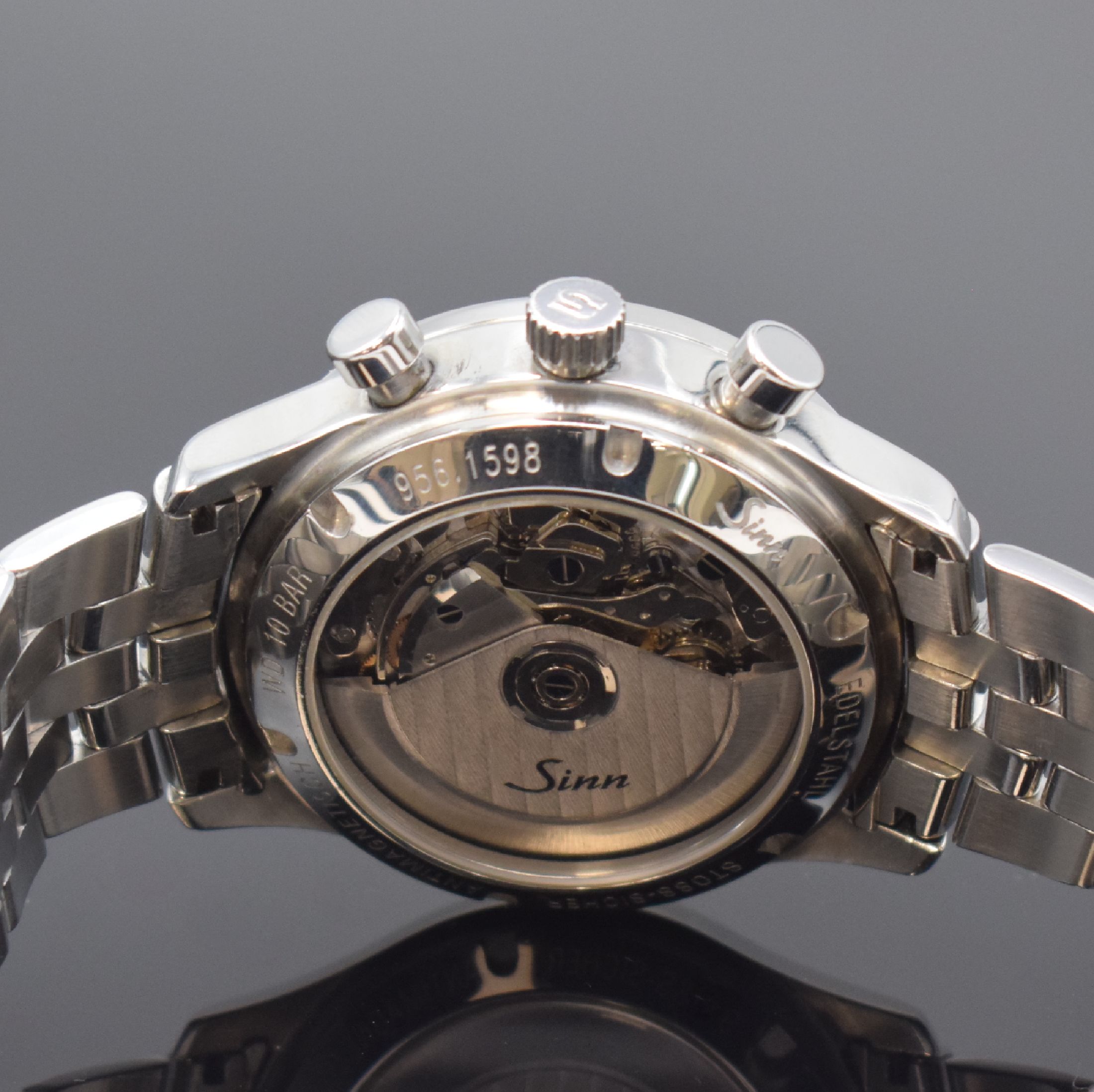 Detail d: SINN Armbandchronograph Referenz 956, Automatik, Deutschland 1990er Jahre, verschr. und beids. vergl. Edelstahlgeh. inkl. orig. Gliederband m. dopp. ...