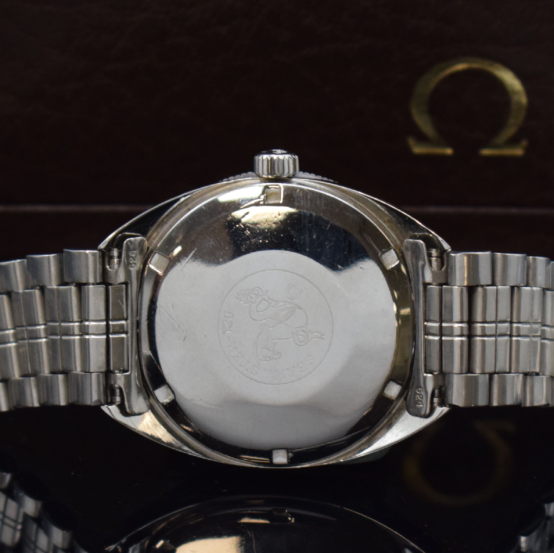 Detail d: OMEGA Seamaster 120 Herrenarmbanduhr in Stahl Referenz 166.027, Automatik, Schweiz um 1969, verschr. Boden m. Seepferdchenlogo, orig. Gliederband m. ...