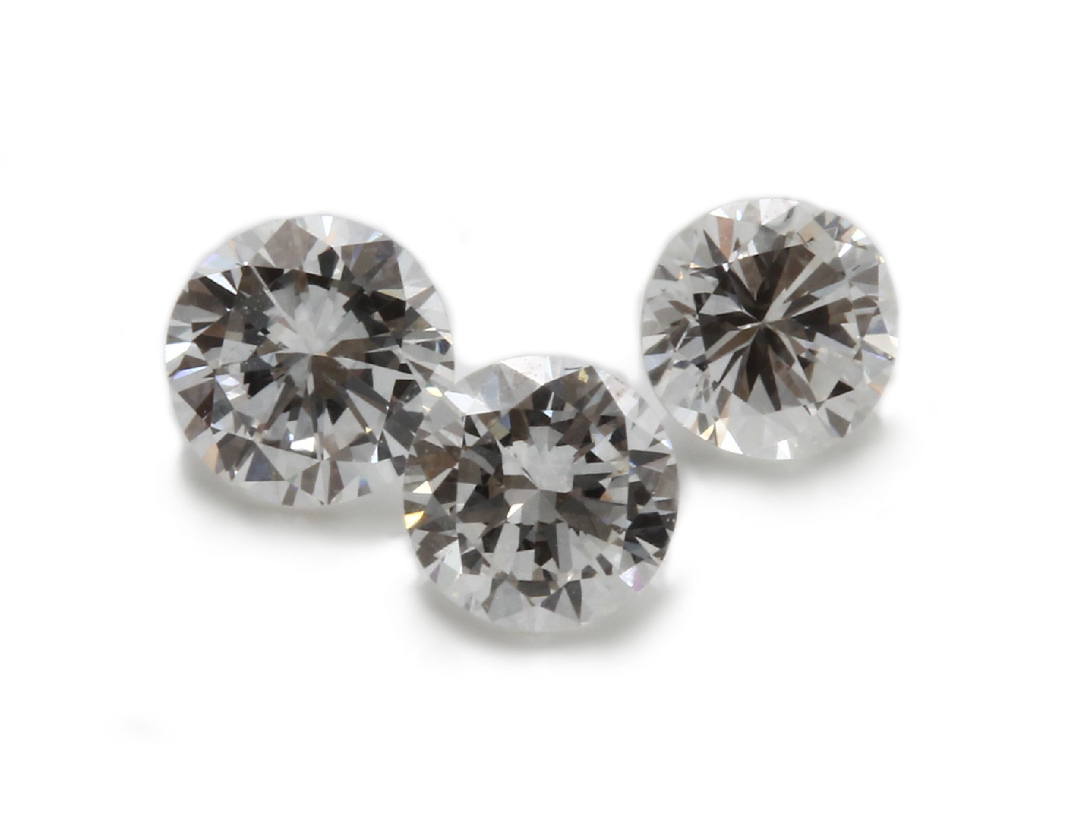 Lot 3 lose Brillanten, ca. 0.64 ct Weiß/vs-si