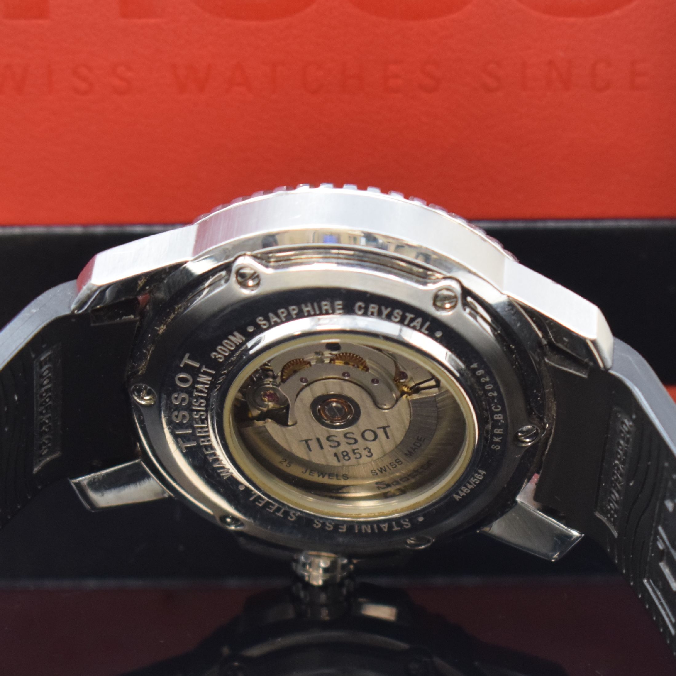 Detail e: TISSOT Herrenarmbanduhr Seastar 1000, Automatik, Schweiz um 2005, beids. vergl. Edelstahlgeh. inkl. orig. Kautschukband m. orig. Faltschl., zus. ...