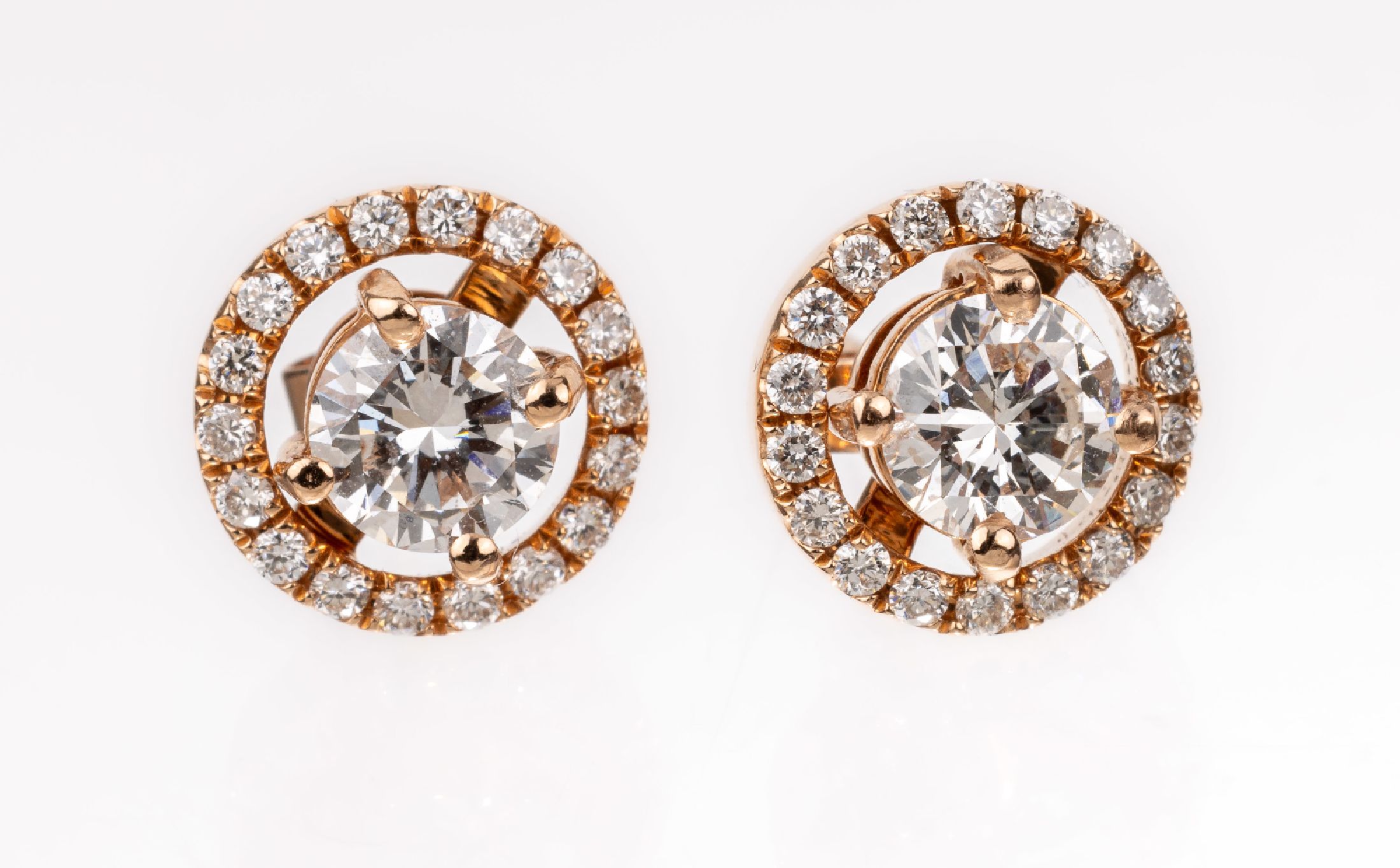 Paar 18 kt Gold Brillant-Ohrstecker, RG 750/000, 2 Brillanten zus. ca. 1.0 ct Weiß/vs-si, abnehmbare Kränze mit 36 Brillanten zus. ca. 0.30 ct ...