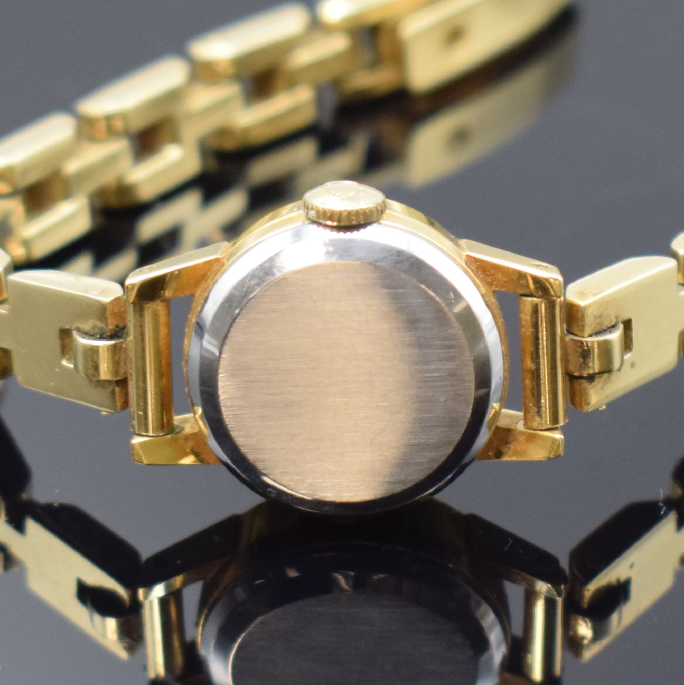 Detail d: OMEGA vergoldete Damenarmbanduhr mit neutralem Goldband in GG 585/000, Schweiz um 1964, Handaufzug, verg. Gehäuse, Stahlboden aufgedr., verg. Werk ...