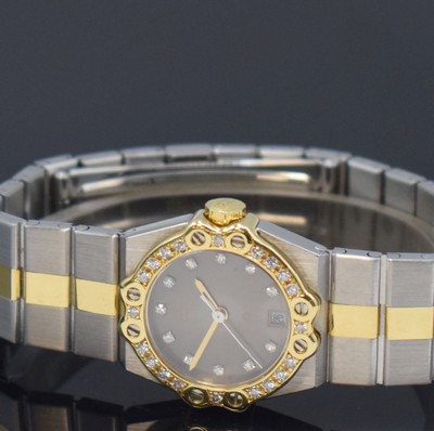 26690945b - CHOPARD St. Moritz ladies wristwatch reference 8024 in stainless steel and gold, Switzerland, quartz, gold bezel and patinated dial set with diamonds, date, bracelet with butterfly buckle, diameter approx. 24 mm, length approx. 15 cm, original certificate enclosed, condition 2-3