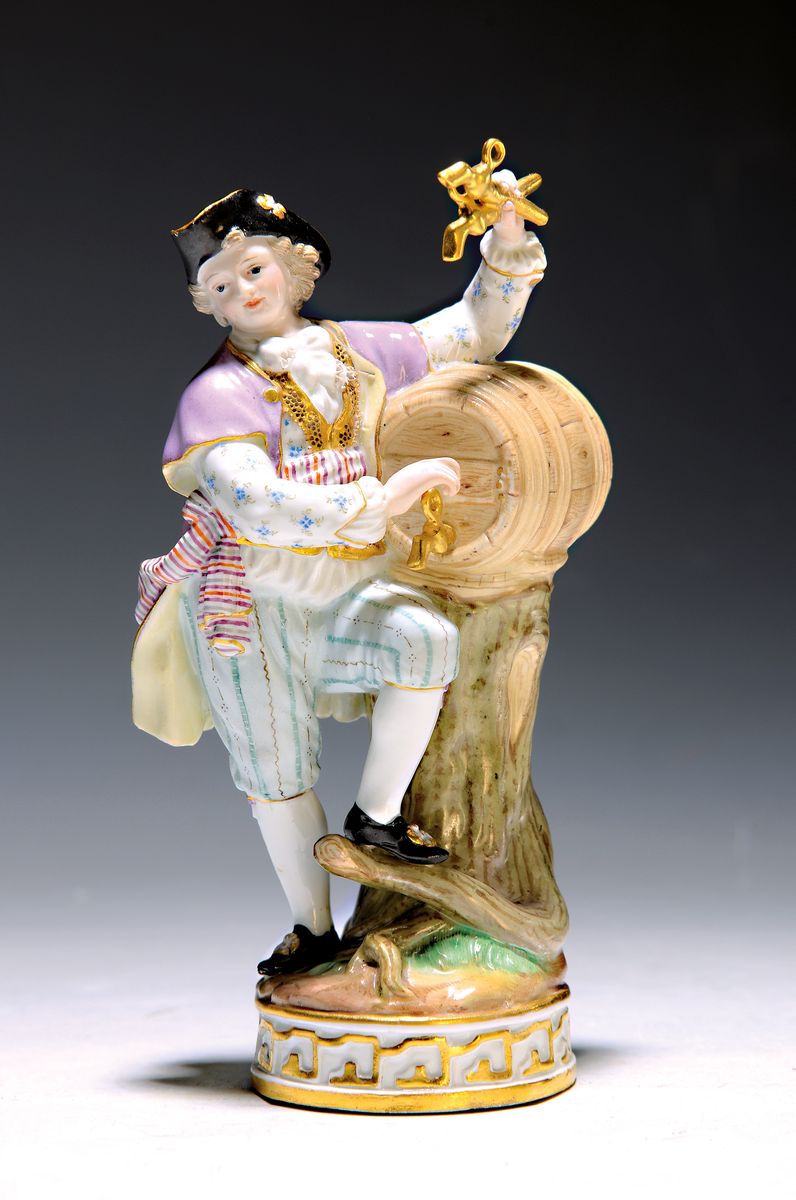 Porzellanfigur, Meissen, Entwurf Michel Victor Acier, um 1880/90, Winzer mit Fass, Modellnr. F 80, feine polychrome Bemalung, Goldstaffage, an einer ...
