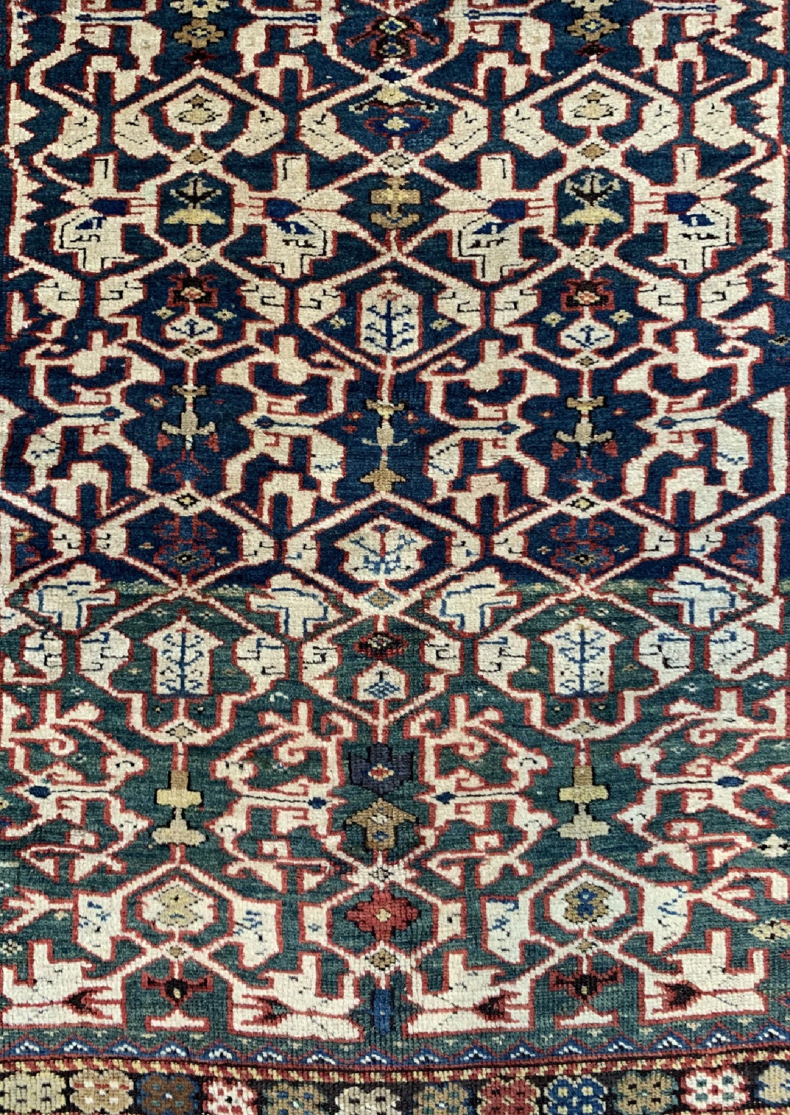 Detail b: Antiker Kazak"Konagend", Kaukasus, 19.Jhd, Wolle auf Wolle, ca. 247 x 125 cm, EHZ: 2-3, (Restauriert).