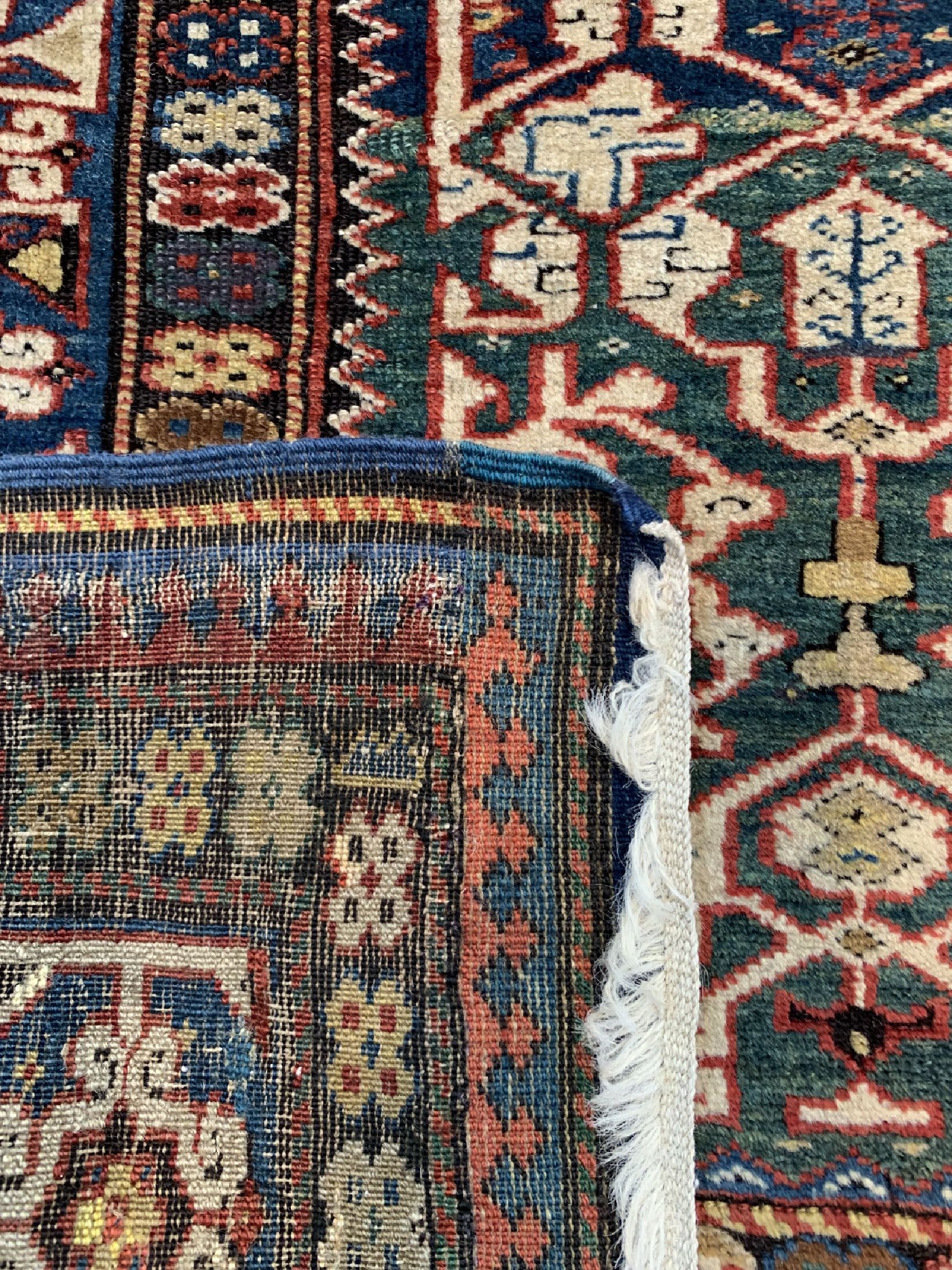 Detail e: Antiker Kazak"Konagend", Kaukasus, 19.Jhd, Wolle auf Wolle, ca. 247 x 125 cm, EHZ: 2-3, (Restauriert).