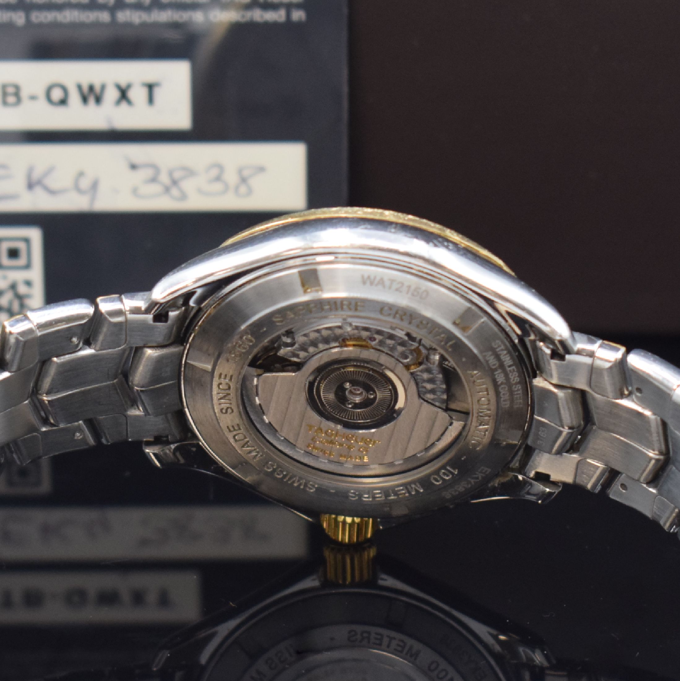 Detail e: TAG HEUER Herrenarmbanduhr Link Calibre 6 Referenz WAT2150, Schweiz um 2015, Automatik, Edelstahl/Gold kombiniert inkl. Gliederband m. Faltschl., ...