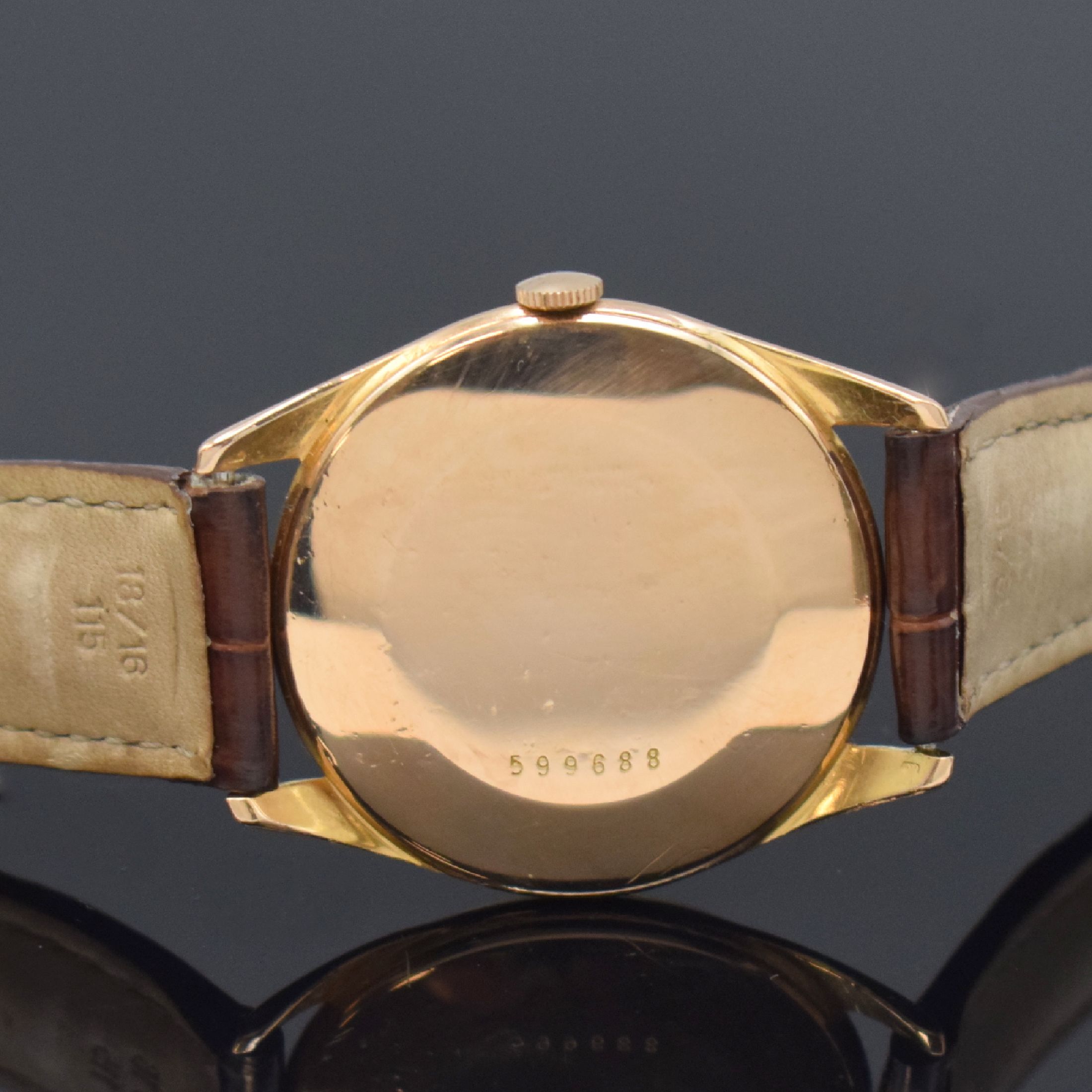 Detail c: ZENITH Herrenarmbanduhr in RG 750/000, Schweiz um 1955, Handaufzug, 3-tlg. Geh., Boden u. Glasrand aufgedr., silb. Zifferbl. pat., rotgold. Indizes ...