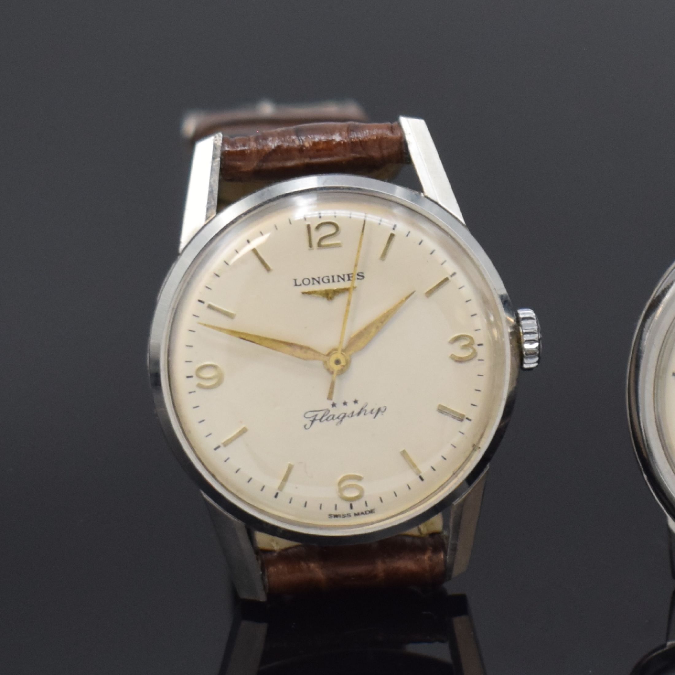 Detail a: LONGINES Flagship 2 Herrenarmbanduhren in Stahl, Schweiz um 1964 / 1980, Handaufzug, gedr. Geh., 1.) Rückdeckel m. Flagship-Symbol, Zifferbl. rest., ...