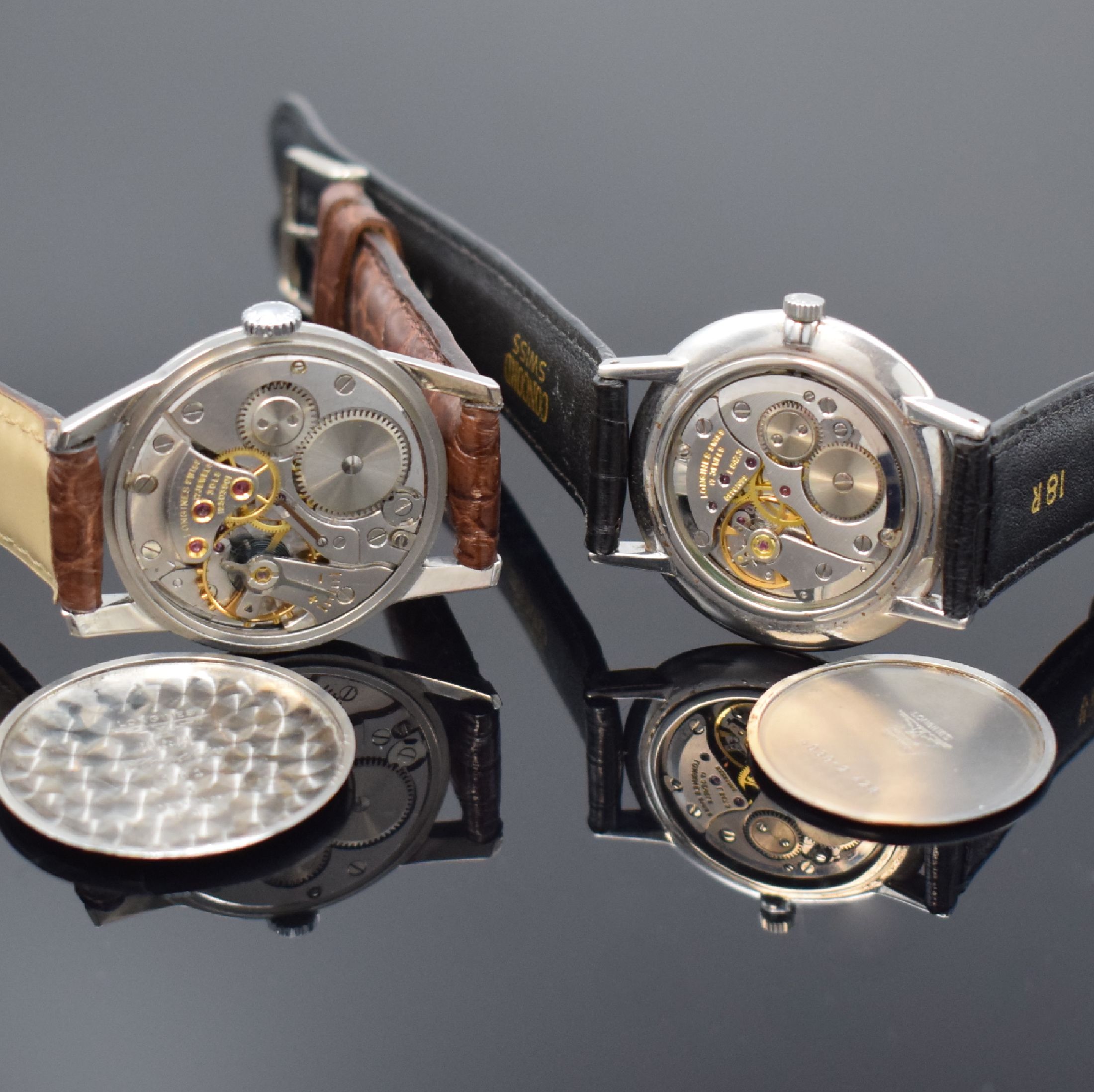 Detail e: LONGINES Flagship 2 Herrenarmbanduhren in Stahl, Schweiz um 1964 / 1980, Handaufzug, gedr. Geh., 1.) Rückdeckel m. Flagship-Symbol, Zifferbl. rest., ...