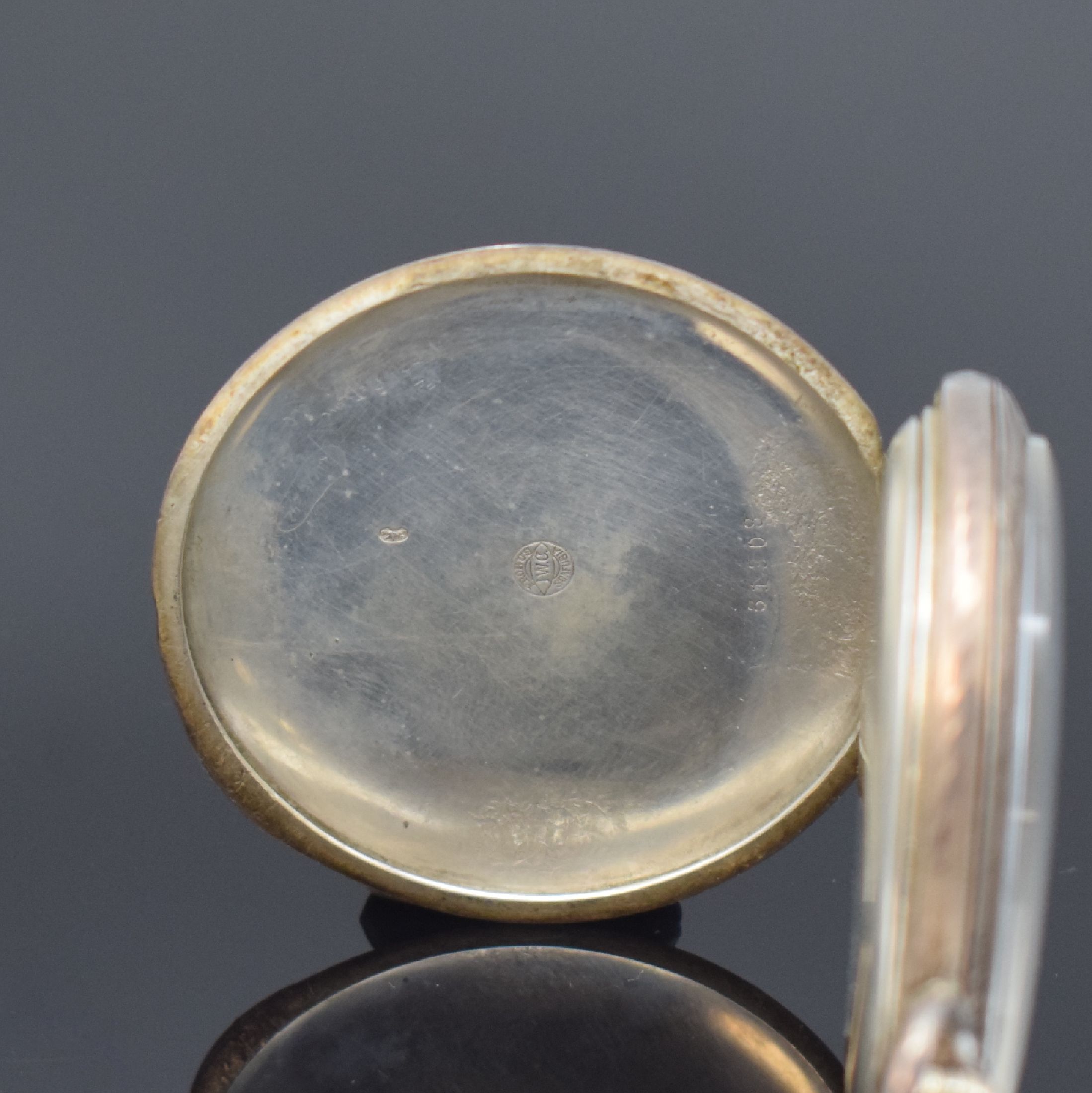 Detail b: IWC offene Taschenuhr in Silber, Schweiz um 1912, Emailzifferbl. m. arab. Zahlen, gold. Zeiger, verg. Werk Kal. 52, Komp.-Unr., gebl. Breguet-Sp., ...