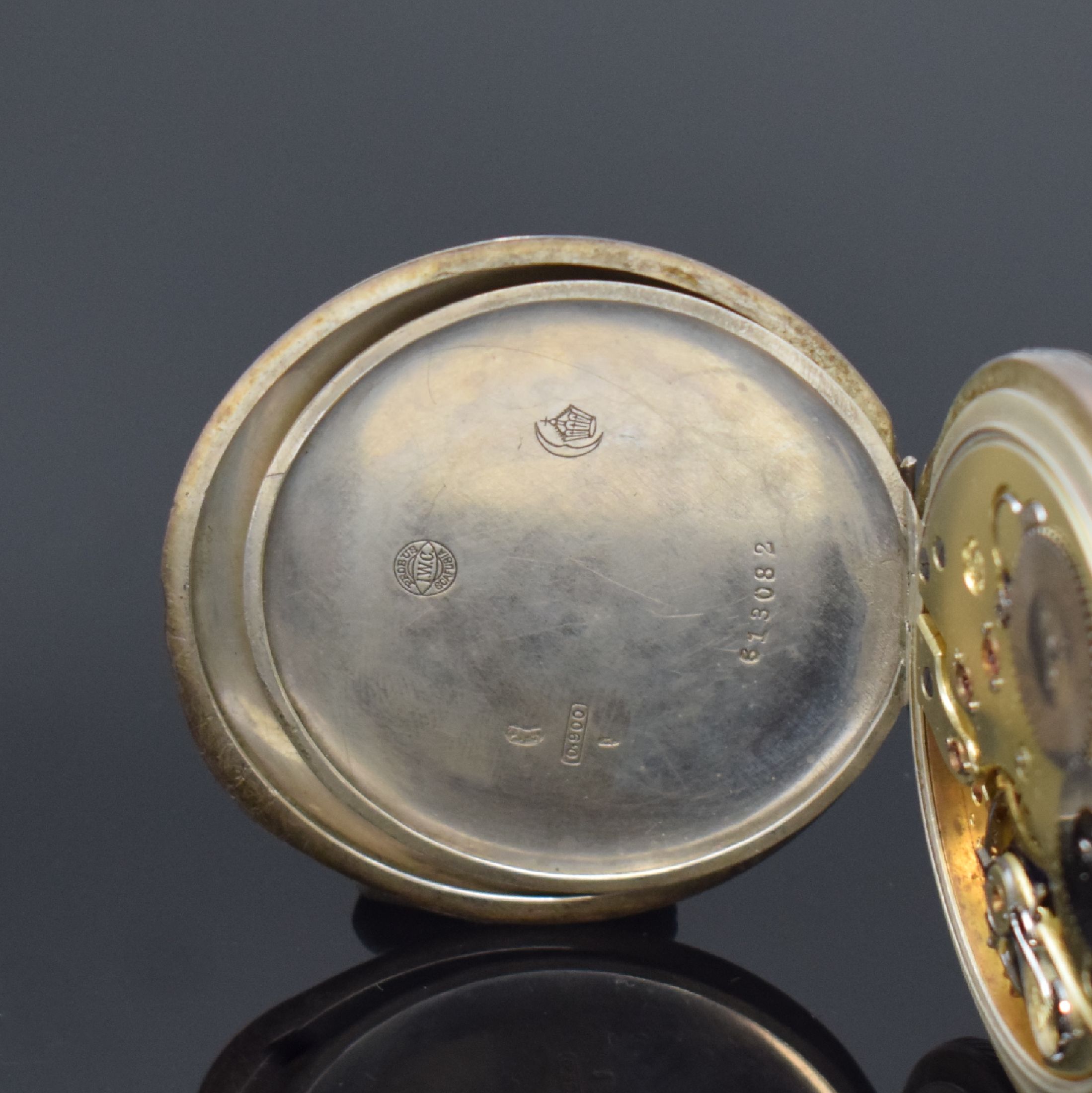 Detail d: IWC offene Taschenuhr in Silber, Schweiz um 1912, Emailzifferbl. m. arab. Zahlen, gold. Zeiger, verg. Werk Kal. 52, Komp.-Unr., gebl. Breguet-Sp., ...