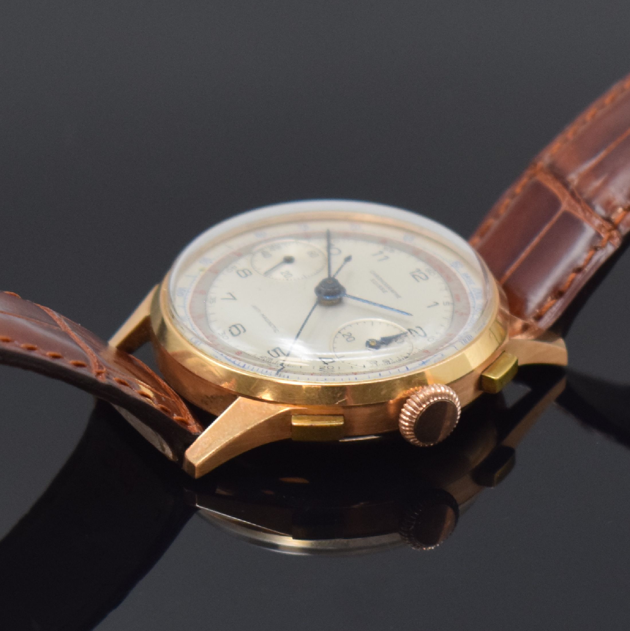 Detail b: CHRONOGRAPHE SUISSE Schaltradchronograph in RG 750/000, Handaufzug, Schweiz um 1948, Boden und Glasrand aufgedr., Metallcuv. zur Armierung, silb. ...