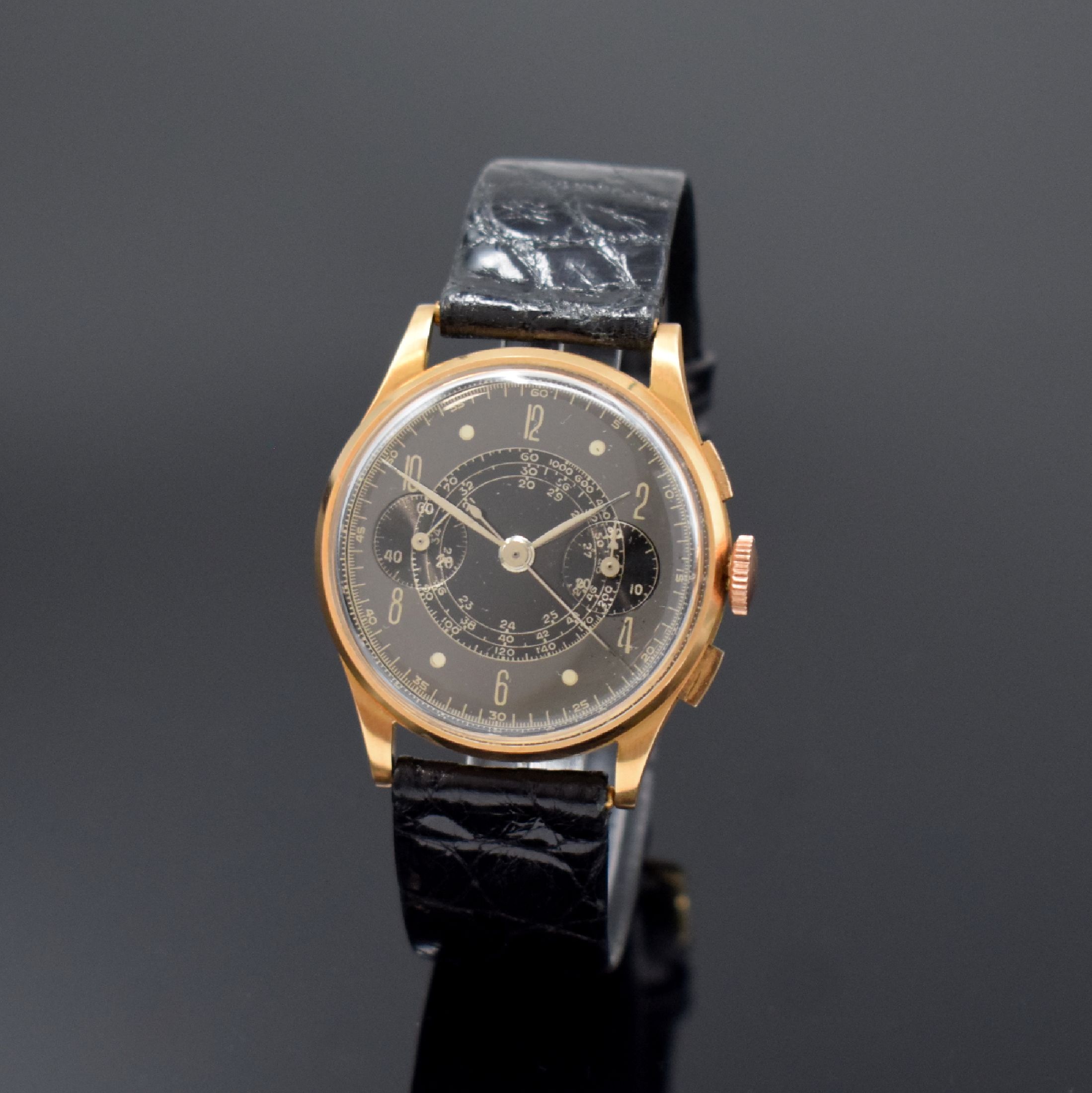 Armbandchronograph in RG 750/000, Schweiz um 1950, Handaufzug, Boden und Glasrand aufgedr., schwarz/graues Duoton-Zifferbl., Kal. Landeron 48, 17 ...