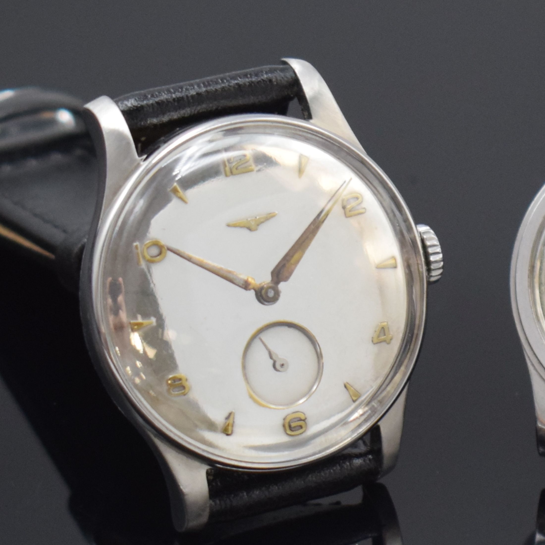 Detail c: LONGINES 3 Armbanduhren in Stahl, Schweiz ca. 1942-1953, verg. Werke, 1) gedr. Geh., Zifferbl. rest., Kaliber 12.68Z, 15 Steine, Komp.-Unruh, D. ca. ...