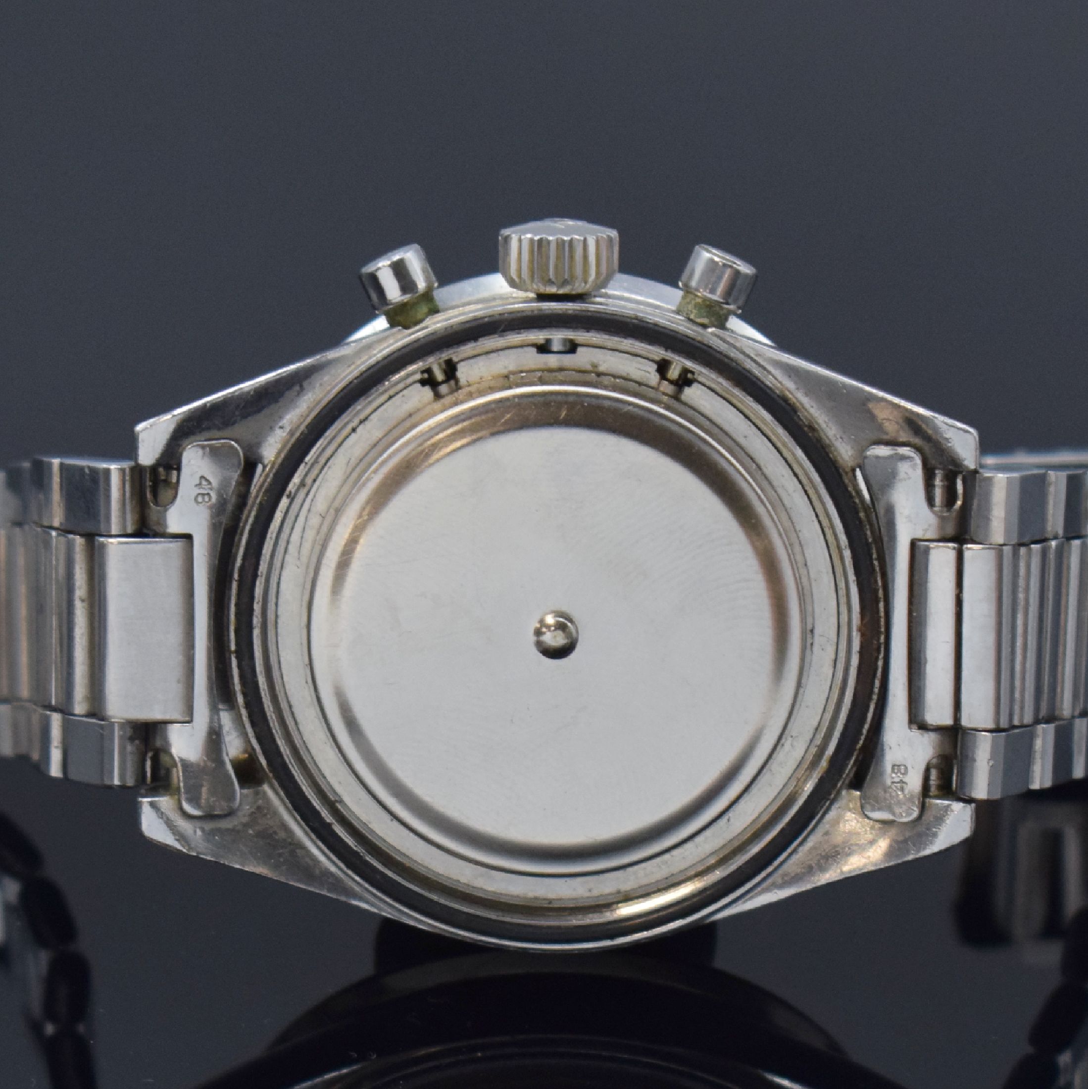 Detail i: OMEGA Speedmaster Herrenchronograph Referenz 2998, Schweiz um 1962, Handaufzug, Stahlgeh., Boden verschr., orig. Omega Stahlband (Anstoß-Nr. 48) m. ...
