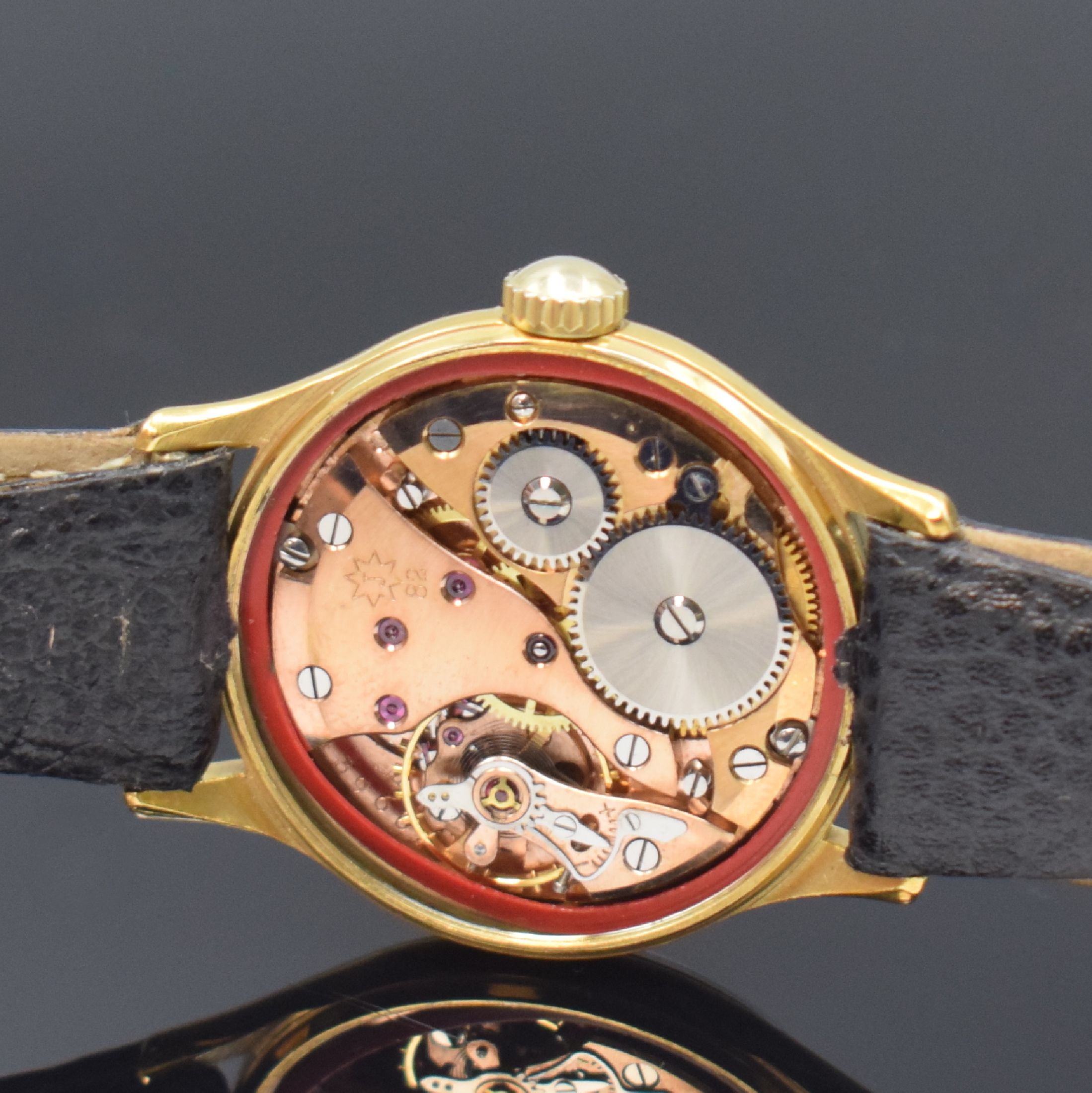 Detail d: JUNGHANS Chronometer Herrenarmbanduhr mit Kaliber 82, Deutschland um 1954, Handaufzug, verg. Gehäuse, Stahlboden geschr., schönes Zifferbl. m. ...