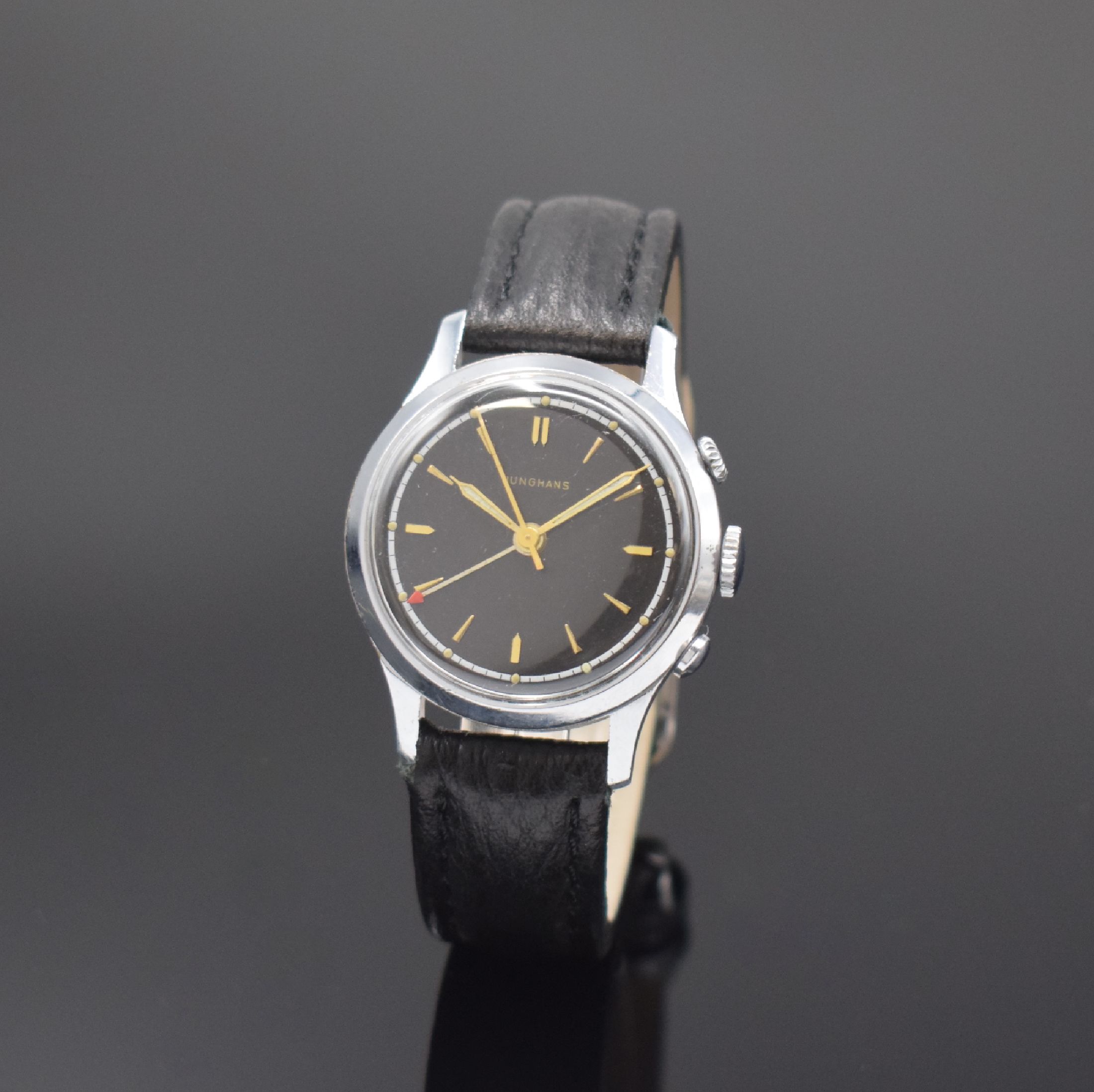 JUNGHANS Armbandwecker mit Kaliber 89, Deutschland um 1952, Handaufzug, verchr. Geh., Stahlboden aufgedr., Krone b. 2 f. Weckzeit, schwarzes ...