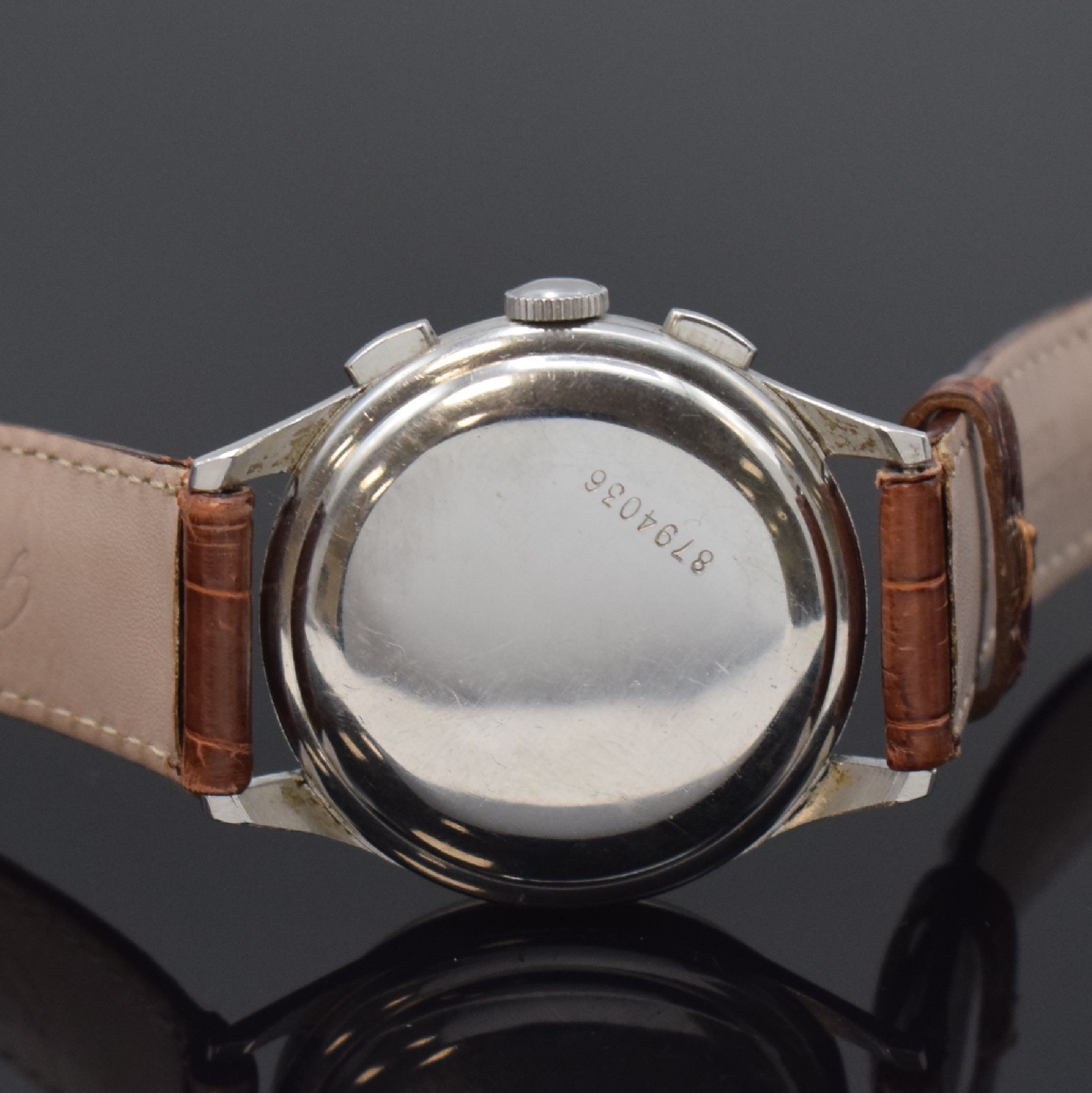 Detail c: ZENITH Kaliber 143-6 Schaltradchronograph in Stahl, Schweiz um 1950, Handaufzug, 3-tlg. Geh., Boden u. Glasrand aufgedr., silb. Zifferbl. pat., gold. ...