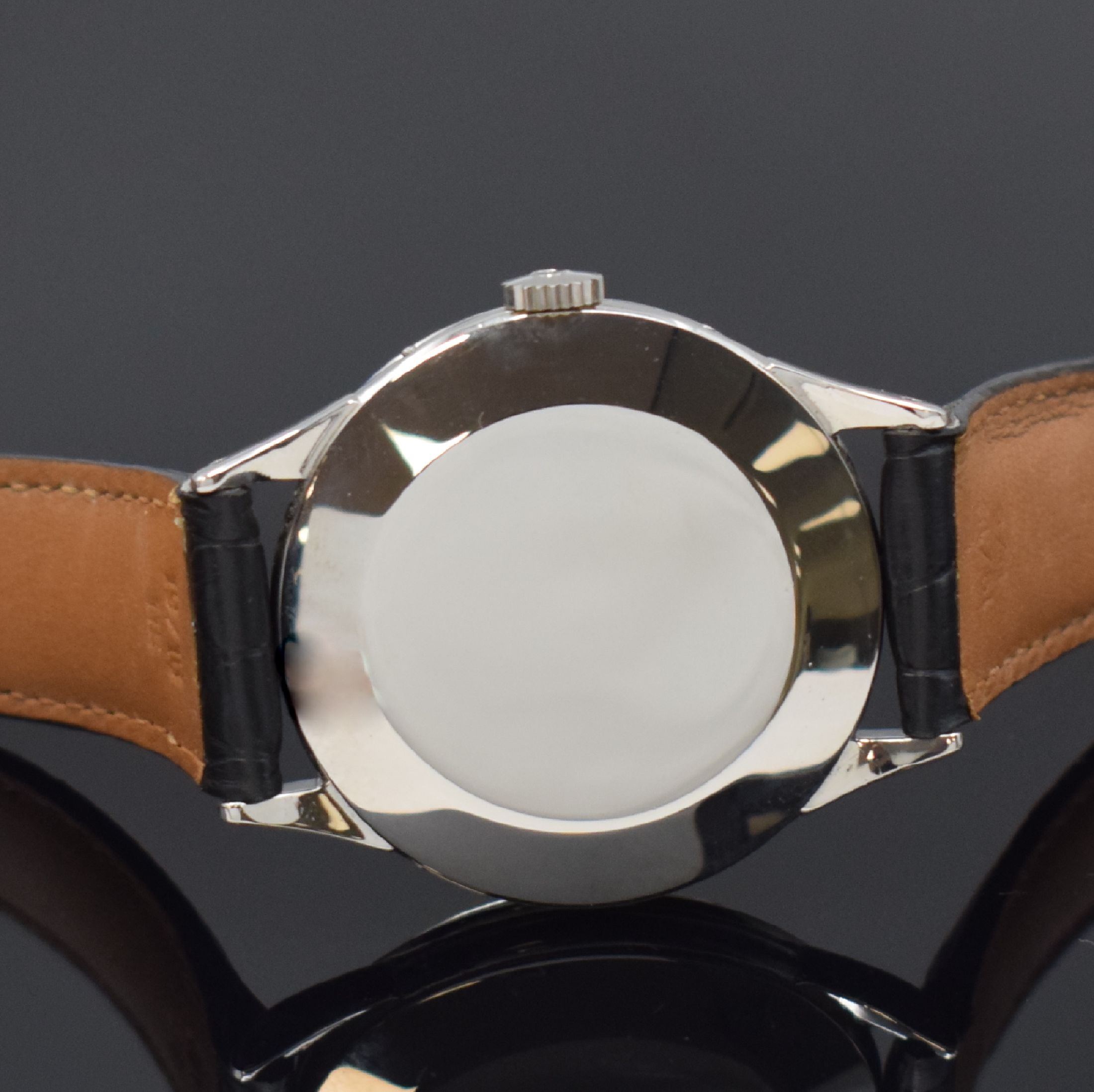 Detail c: OMEGA seltene, astronomische Herrenarmbanduhr Serie Cosmic Referenz 2486-1, Handaufzug, Schweiz um 1953, 3-teil. Edelstahlgeh., Boden und Glasrand ...