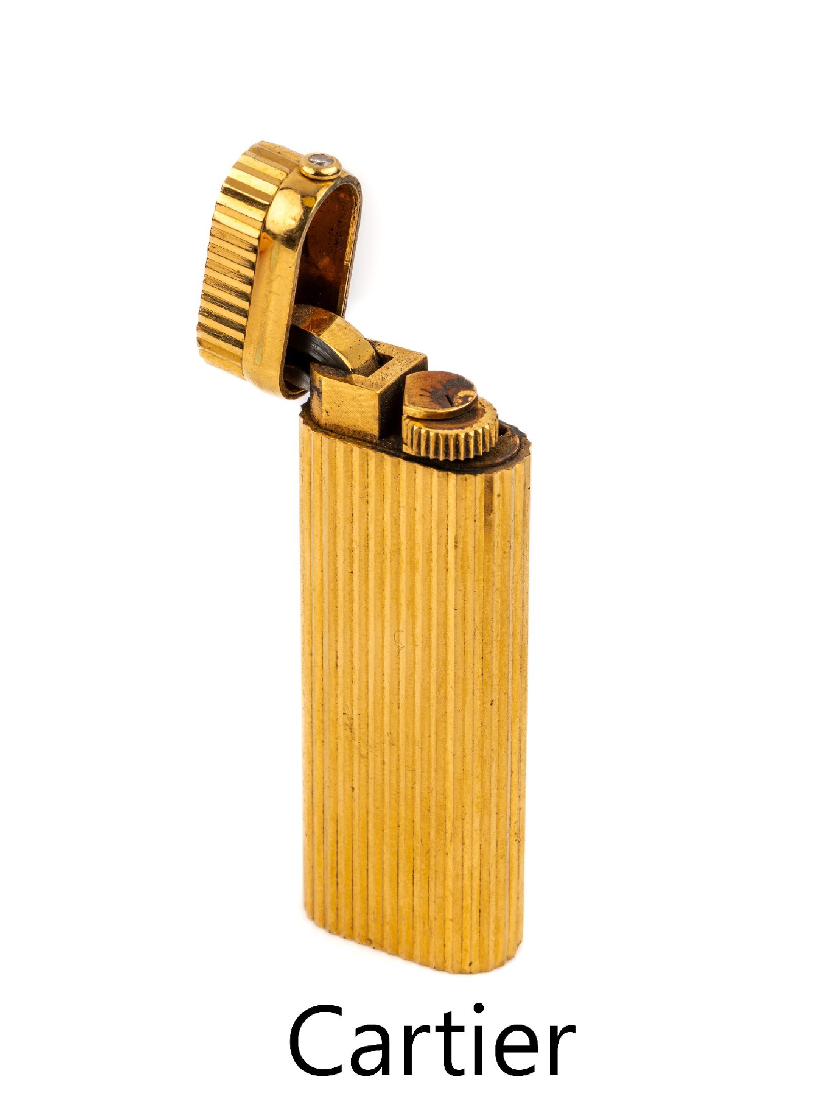 CARTIER Feuerzeug, Metall vergoldet/plaque d' or, Verschluß mit Brillant, Gebr.-sp., fkt.-fähig