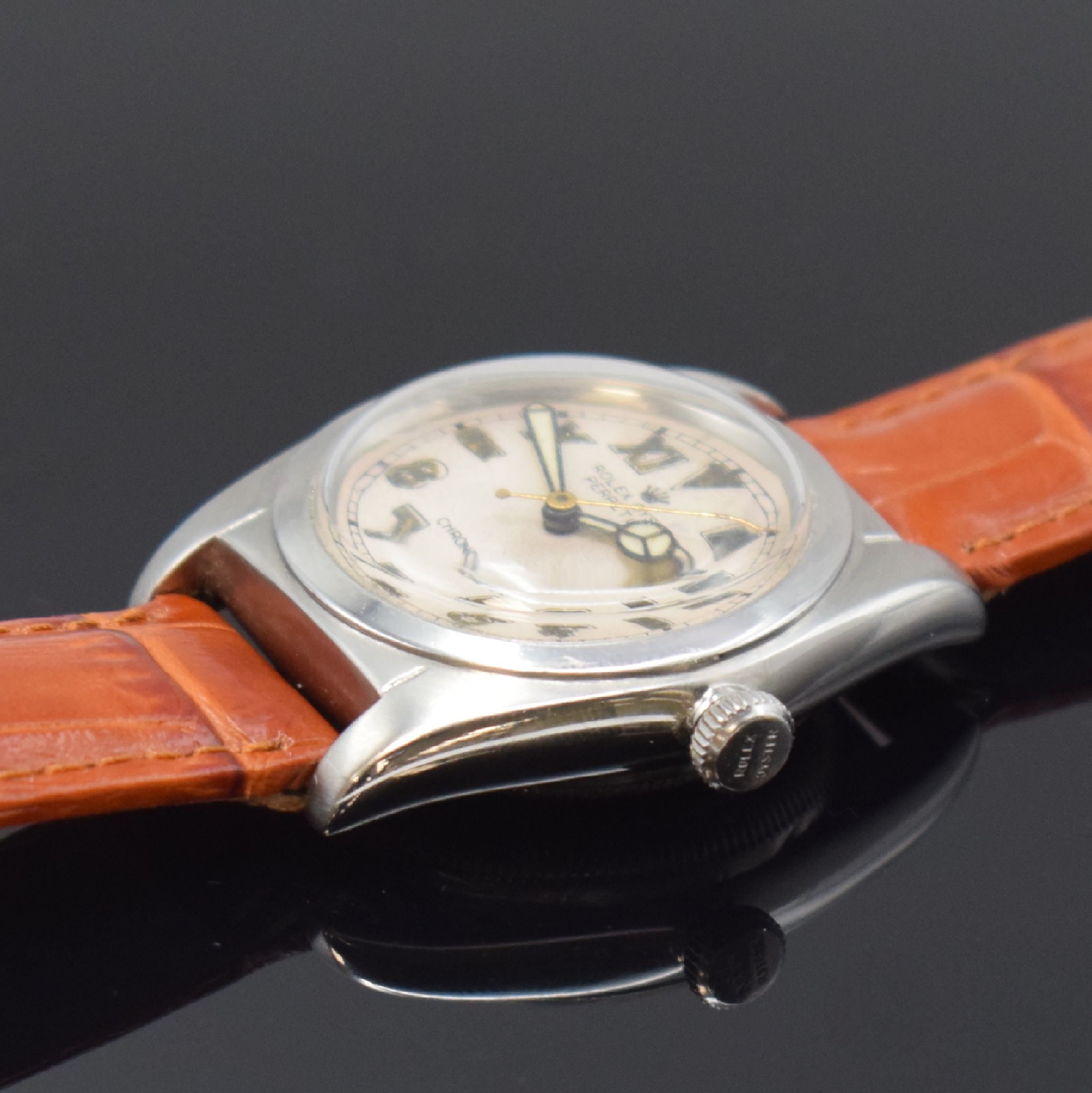 Detail b: ROLEX Bubble Back Referenz 2940 Armbanduhr in Stahl, Schweiz um 1945, Automatik, verschr. Oystergeh. m. glatter Lünette, orig. Krone verschr., silb. ...
