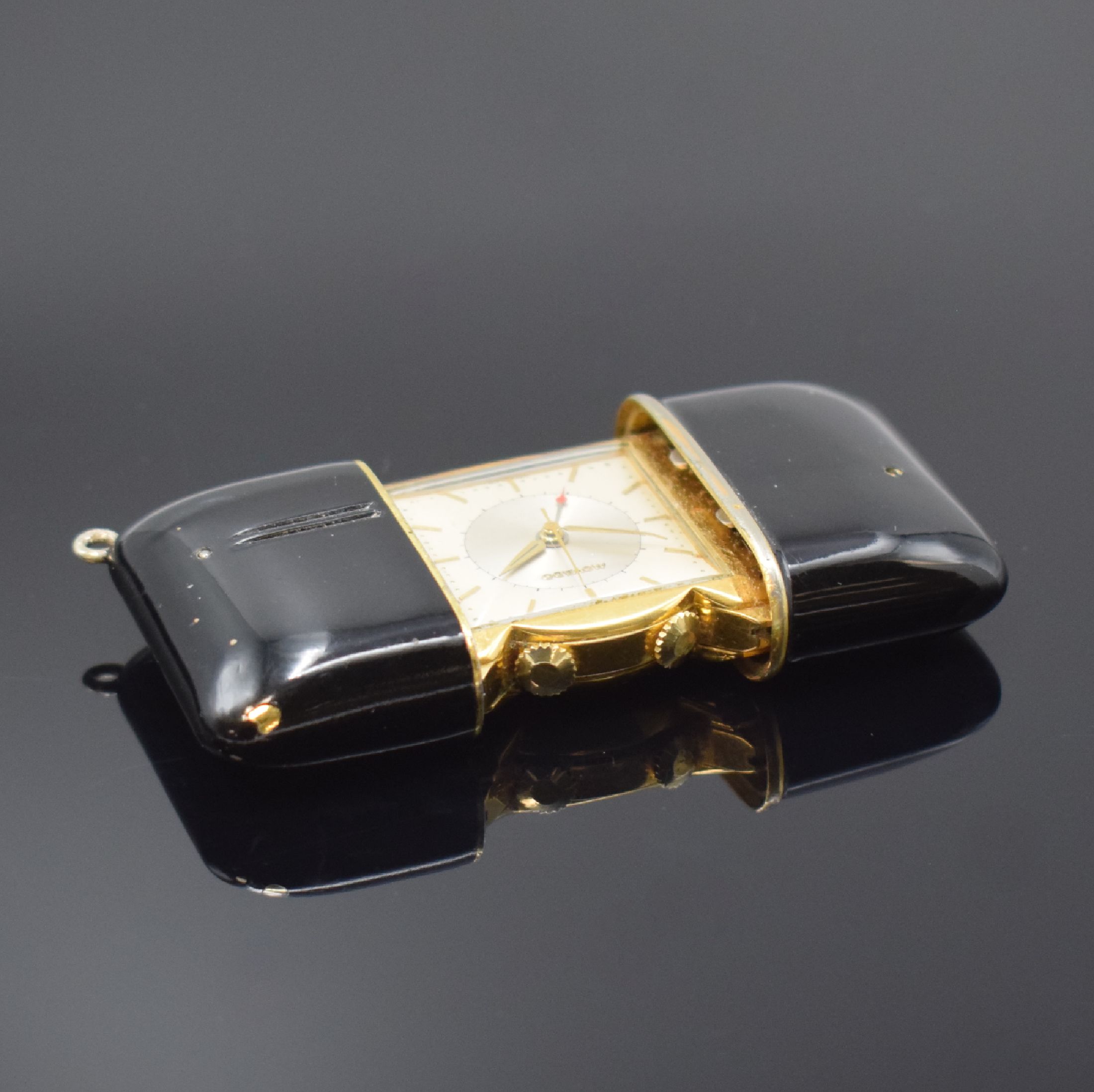 Detail e: MOVADO Ermetophon vergoldeter Taschenwecker, Schweiz um 1950, Schiebeaufzug, verg. Geh. m. aufstellbarem Bügel, Kapsel später schwarz lackiert, ...