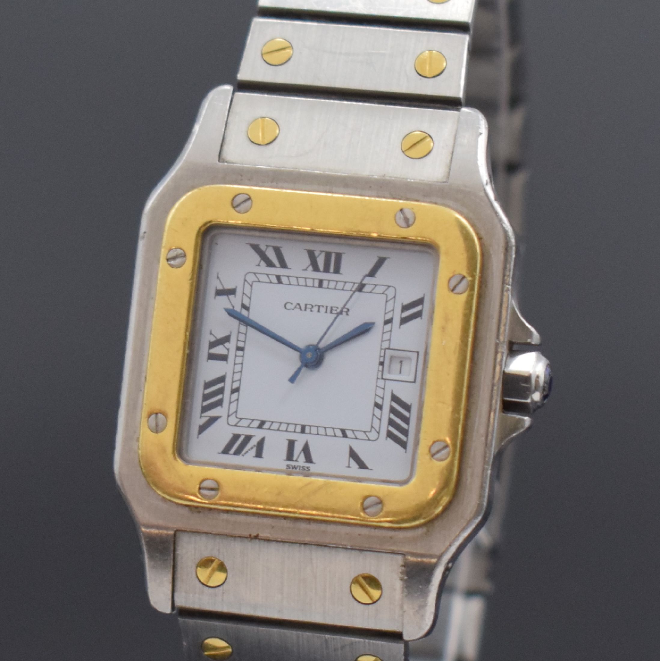 Detail a: CARTIER Santos Herrenarmbanduhr, Schweiz um 1985, Automatik, Edelstahl/Gold kombiniert inkl. Gliederband m. Faltschl., Monocoque- Geh., Lünette ...