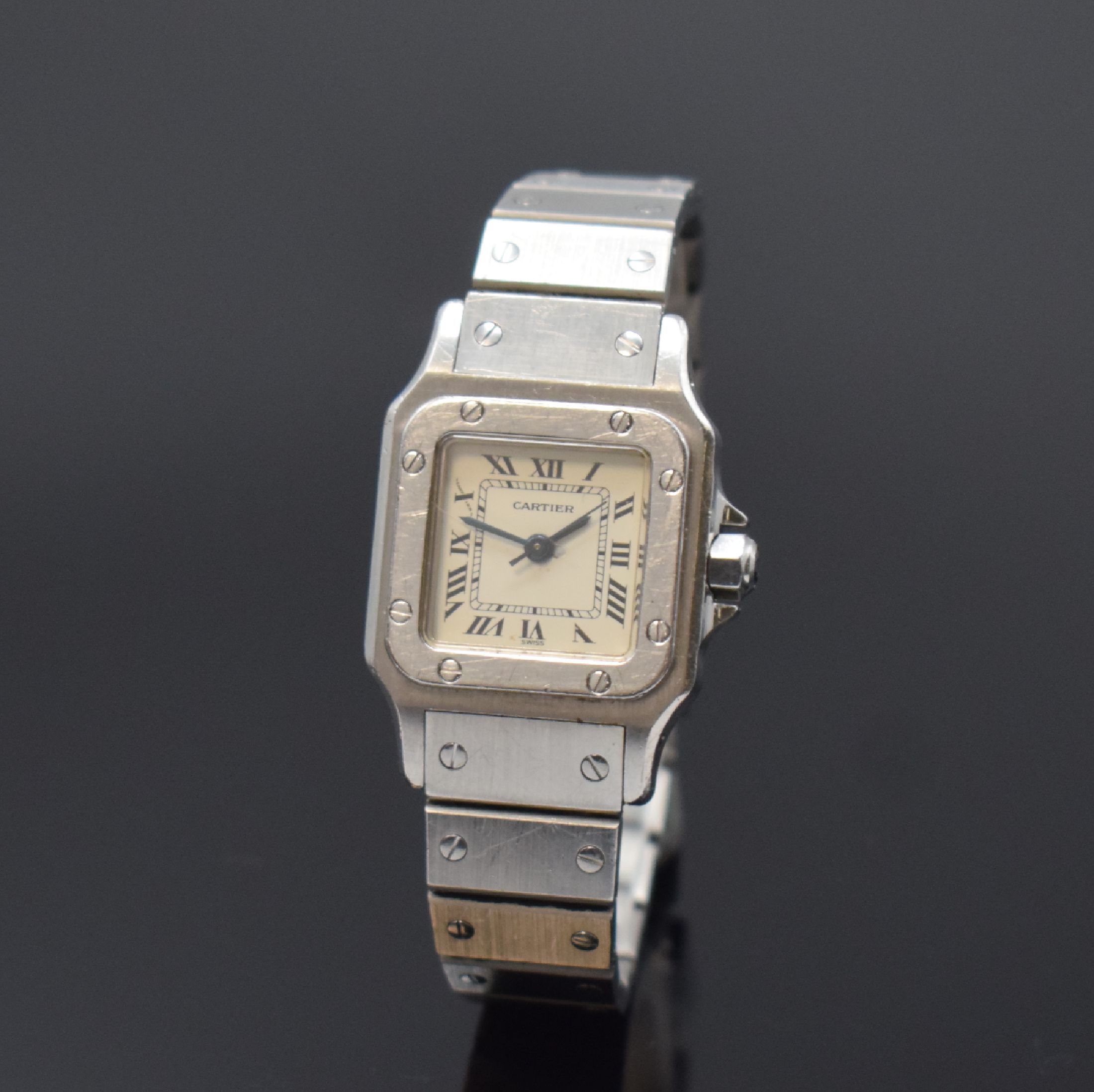 CARTIER Santos Damenarmbanduhr in Stahl, Schweiz um 1990, Automatik, Boden u. Lünette 8-fach verschr., Gliederband m. Faltschl., Schmuckkrone ...