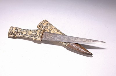 Image 26691408 - Dagger, Mughal, 20th century, handle and sheath carved bone, with dignitaries, plants and animals, double-edged blade with niello decoration, length approx. 36.5 cm, application missing