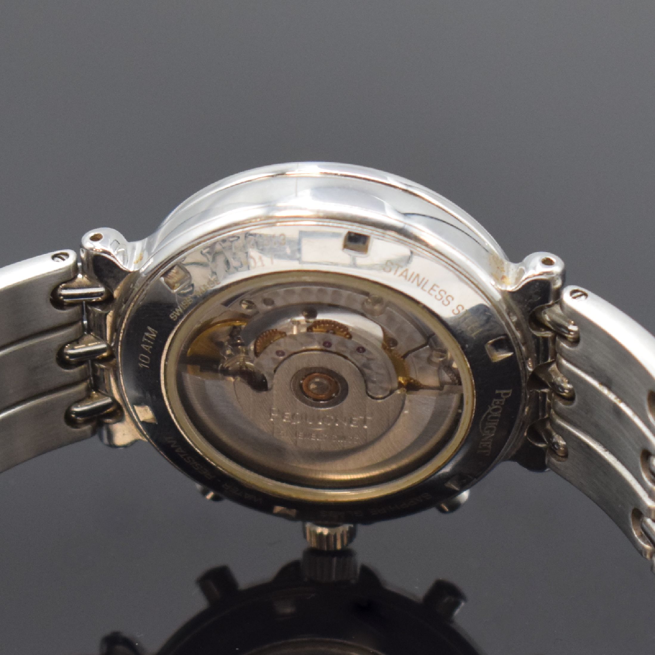 Detail d: PEQUIGNET Chronometer Herrenarmbanduhr mit Chronograph in Stahl, Schweiz um 2000, Automatik, beids. verg. Geh., Boden u. Krone verschr., Stahlband m. ...