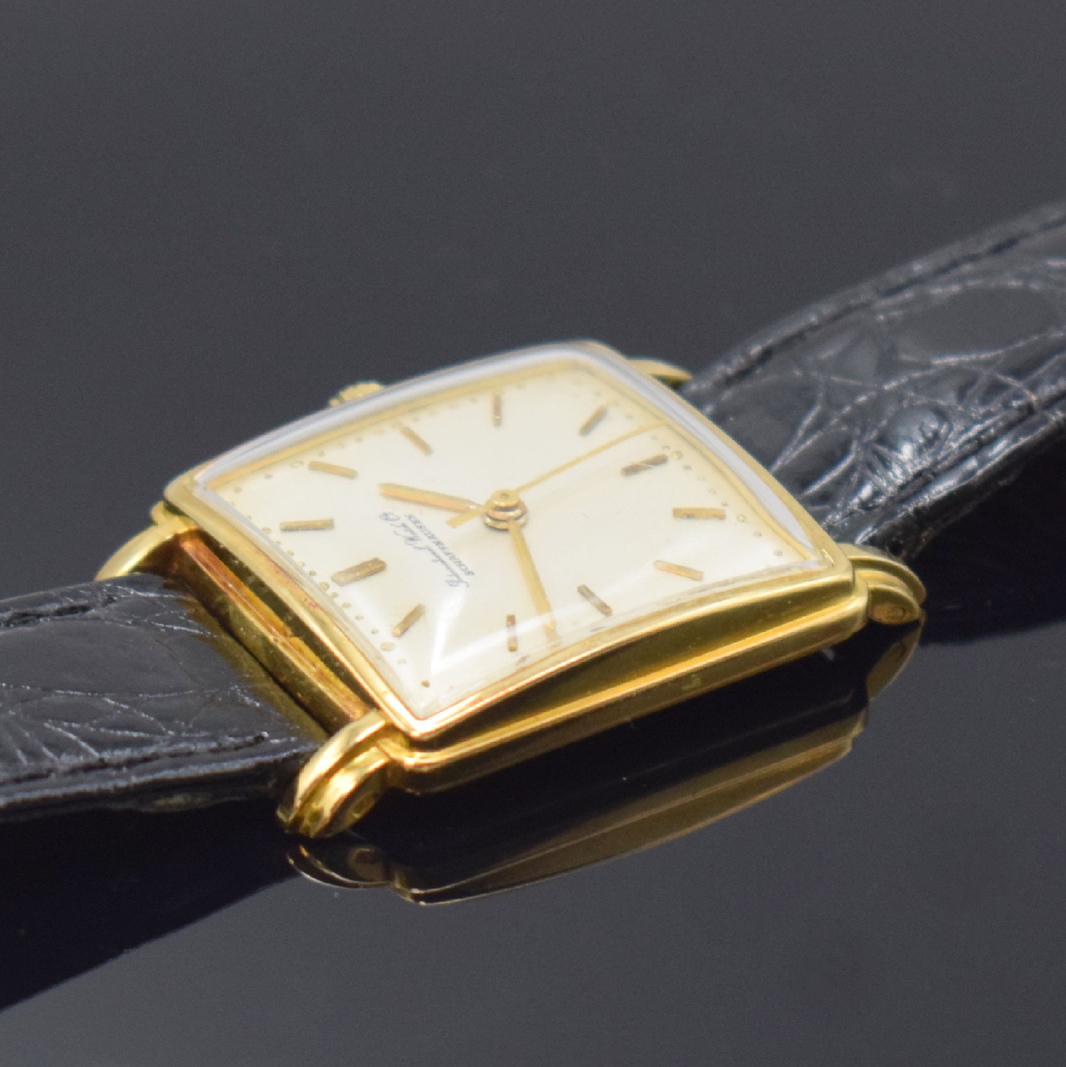 Detail c: IWC viereckige Armbanduhr in GG 750/000, Schweiz um 1957, Handaufzug, aufgedr. Boden l. dell., rest. silb. Zifferbl. fl., gold. Std.-Ind., gold. ...